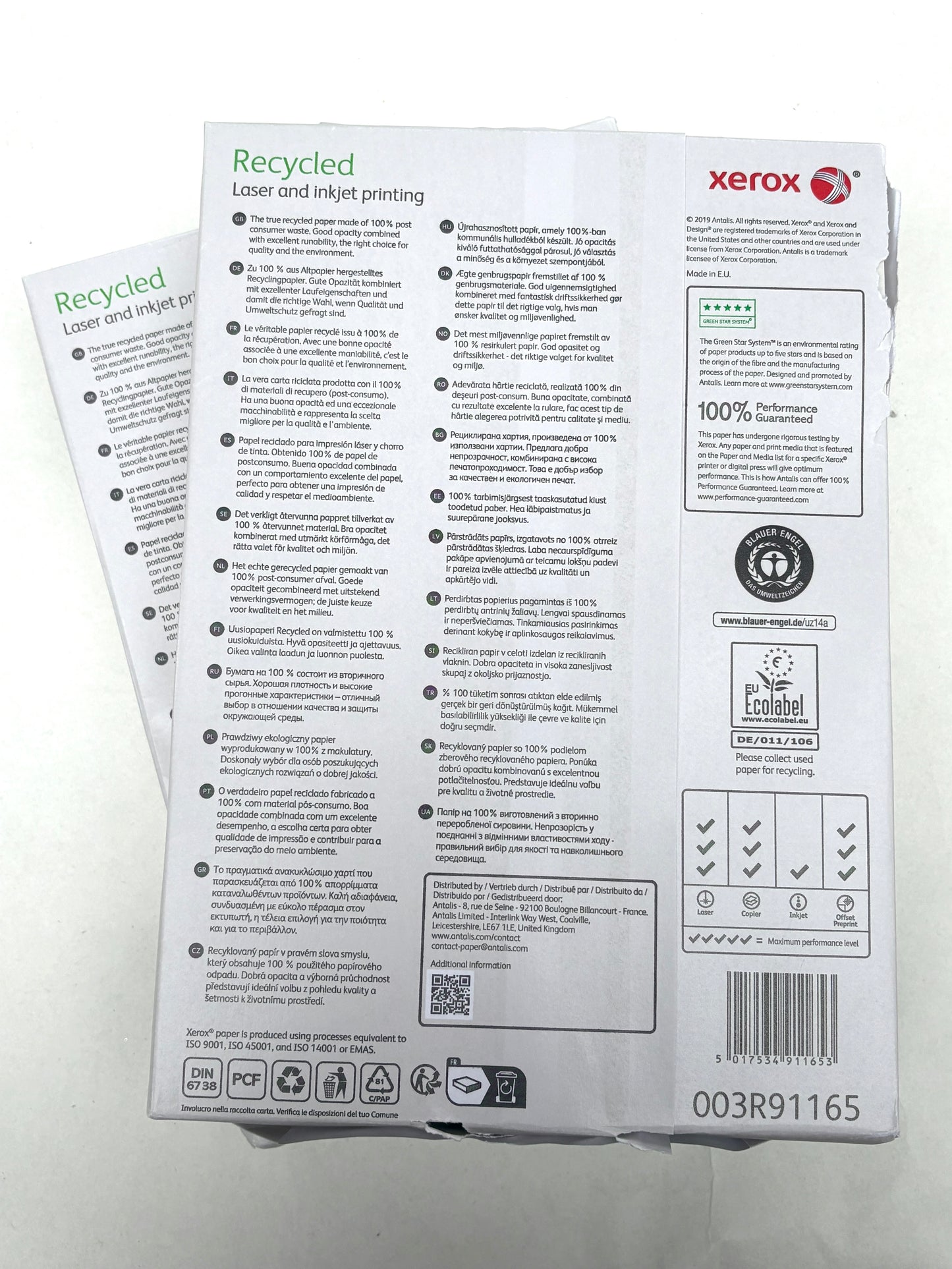 Stacked paper packs are shown on a white background