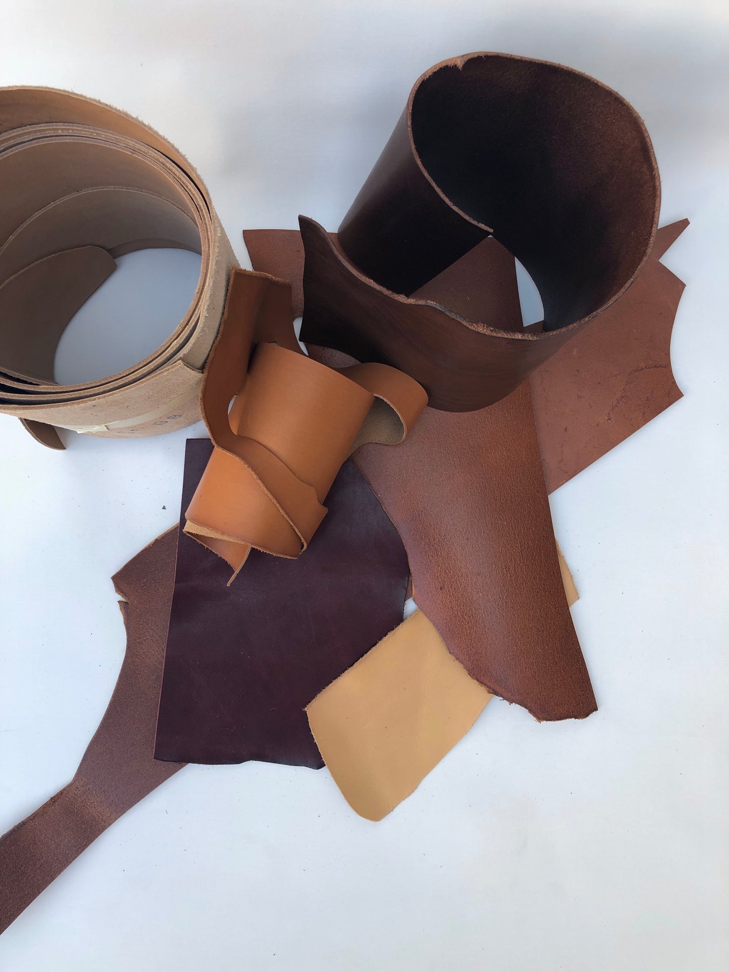 Collection of brown leather offcuts in various sizes