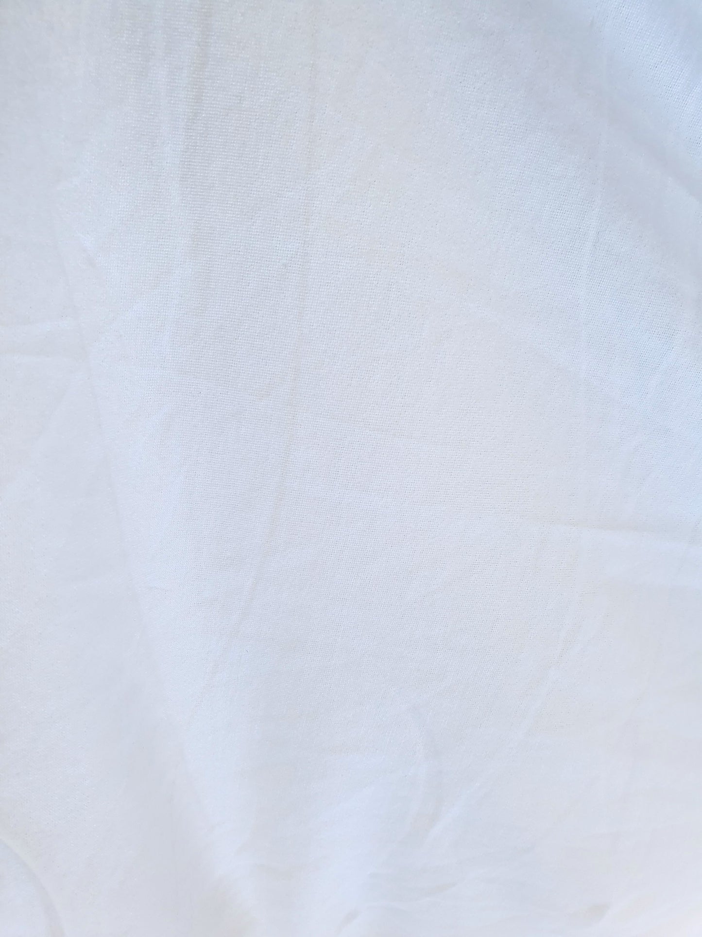 Close-up of wight weighted jersey fabric in white