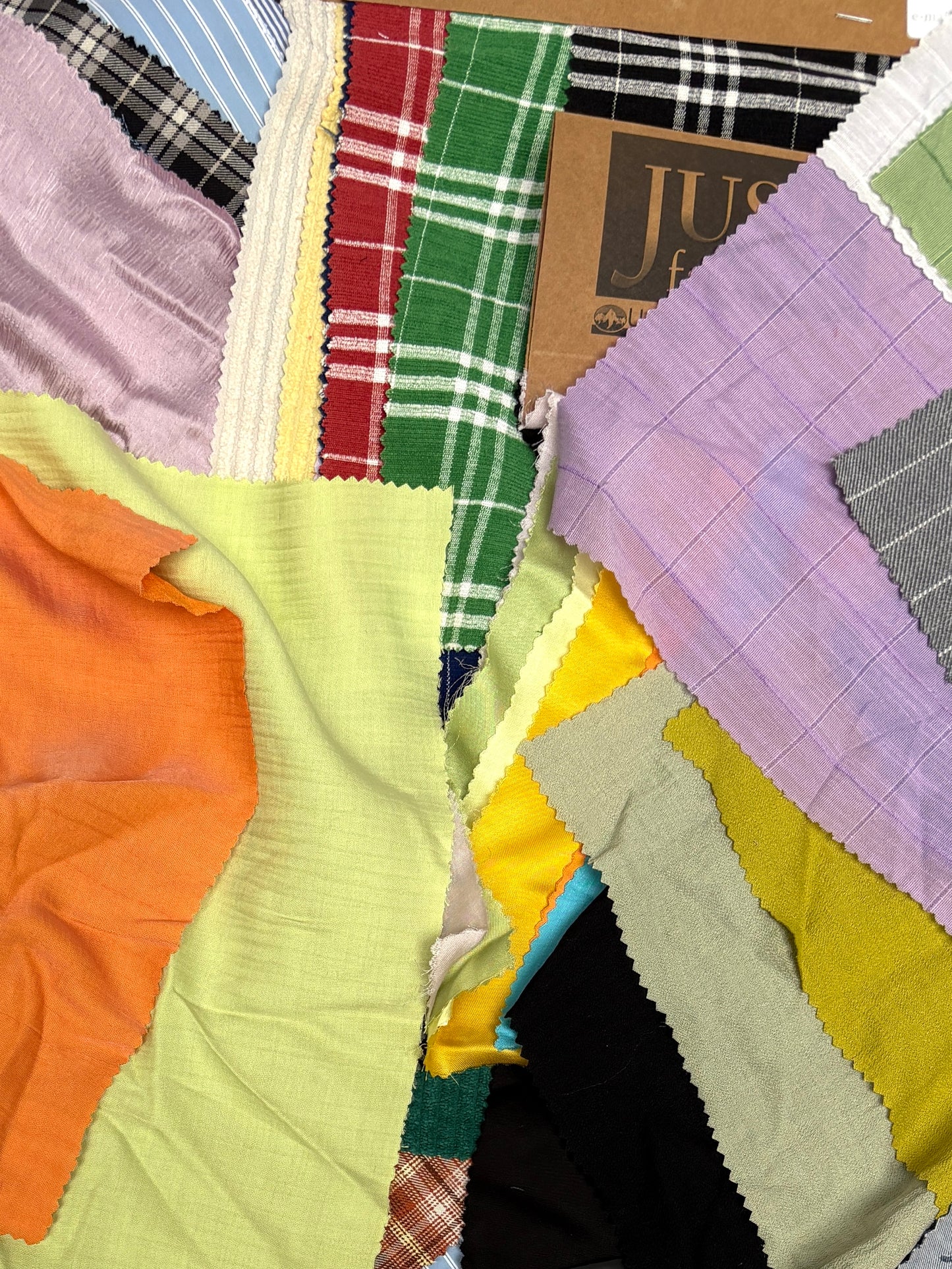 Collection of patterned fabric samples in various colours