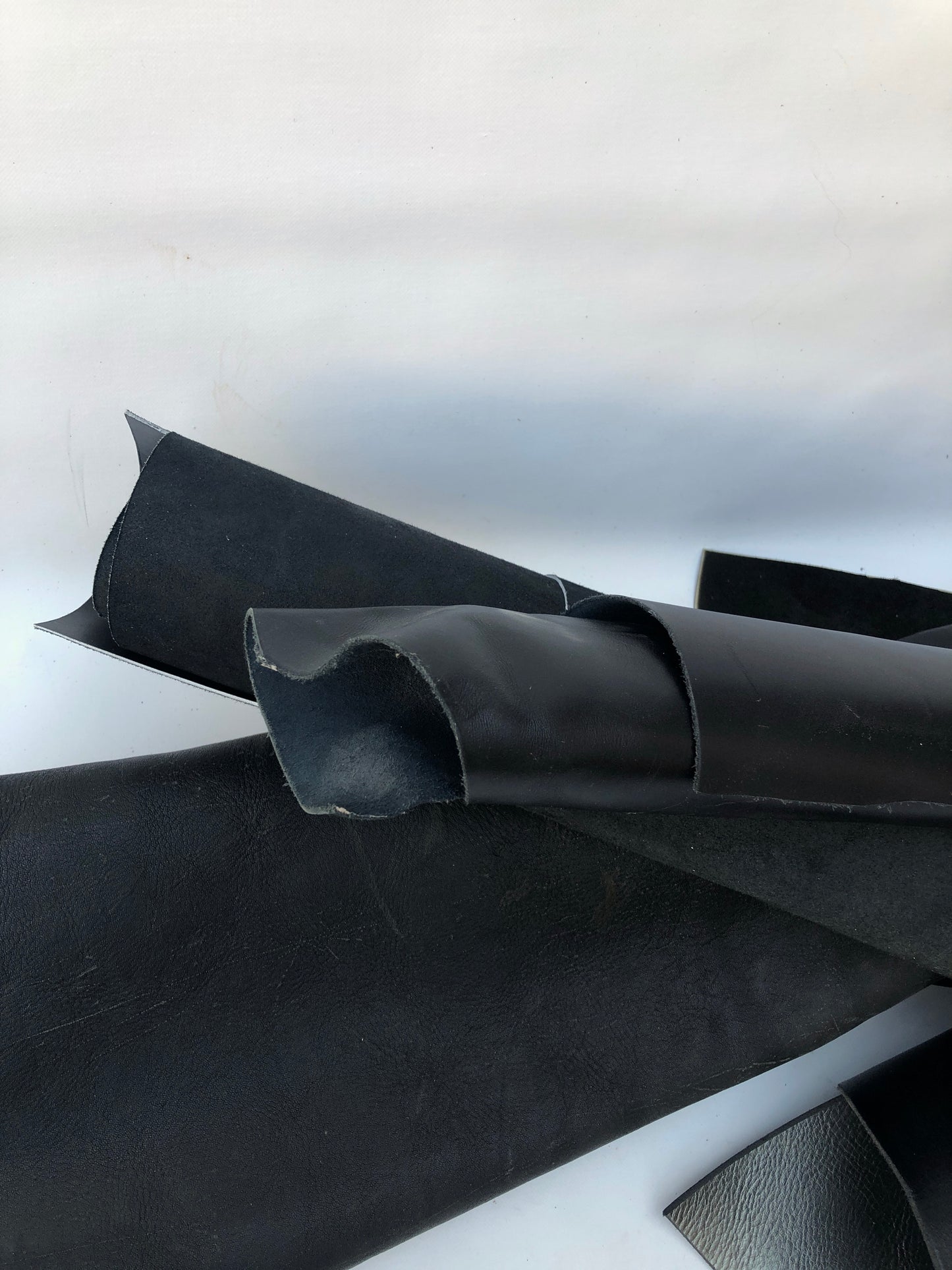 Close-up of black rolled leather