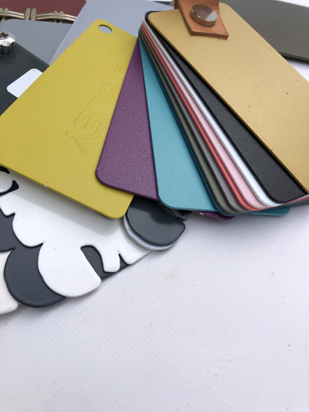 Close-up of colourful metal sample bundles