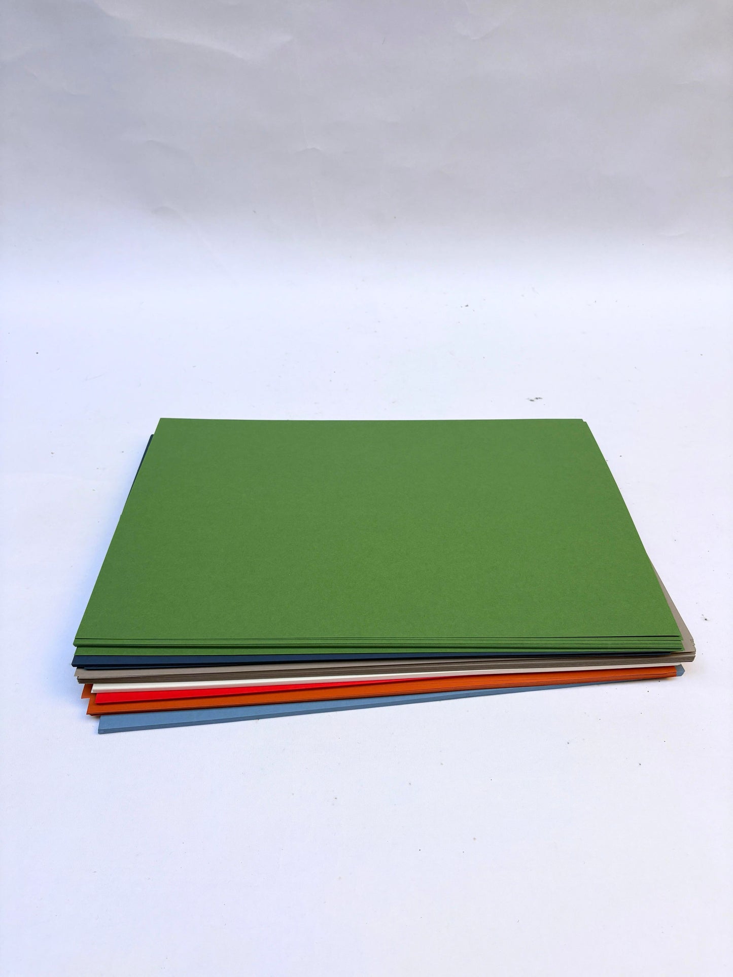 Stack of coloured papers