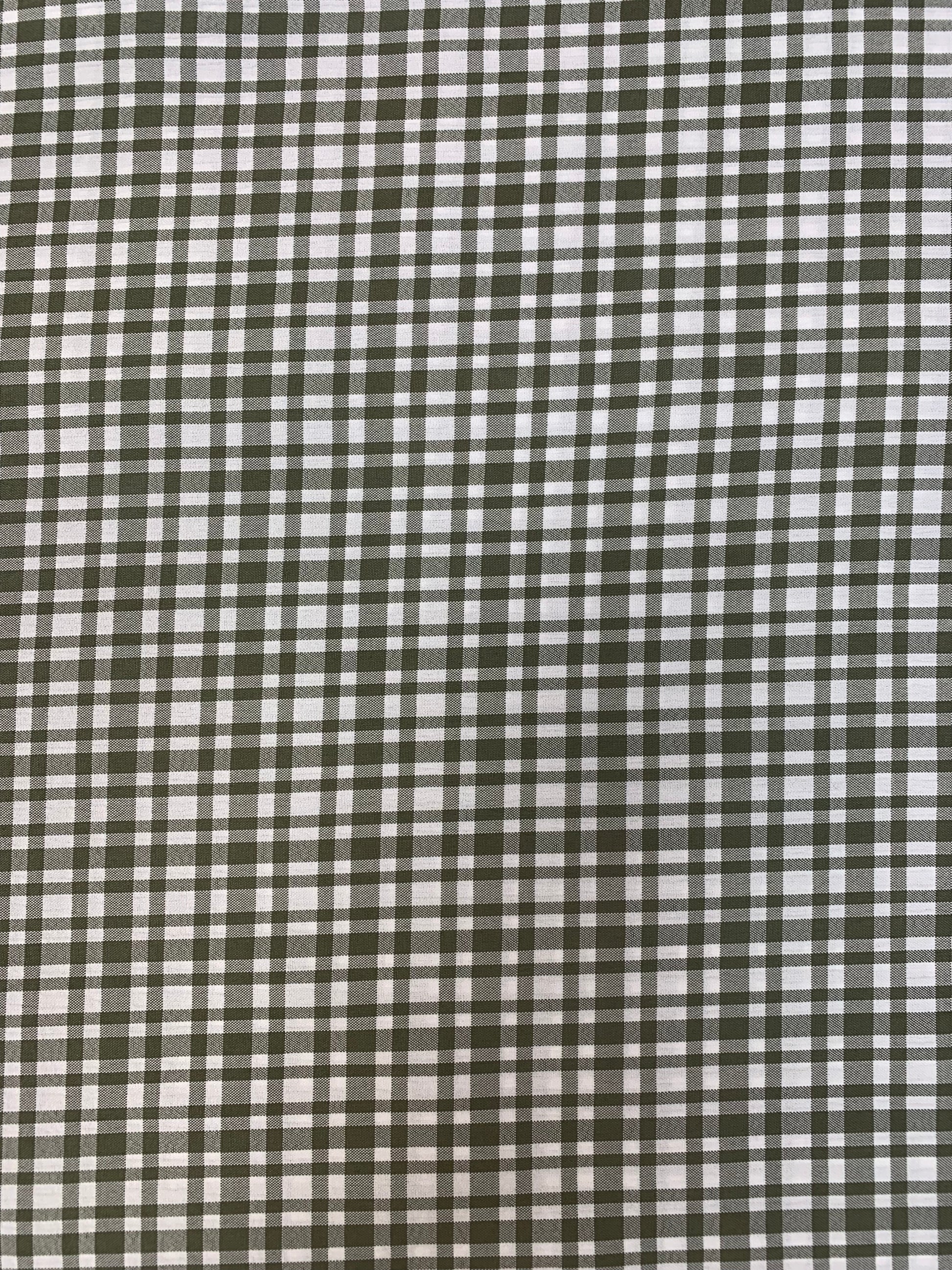 Fabric detail showing the khaki and white apple check pattern.