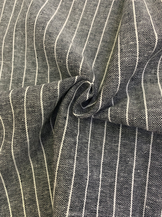Close-up of black fabric with white stripes