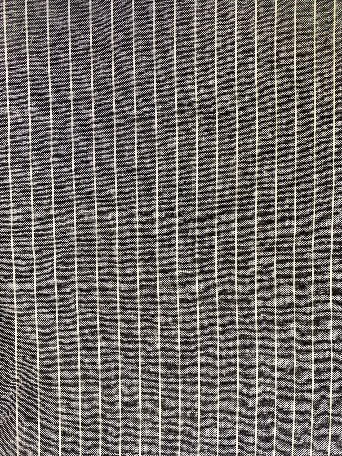 Fabric detail showing the black and white striped design.