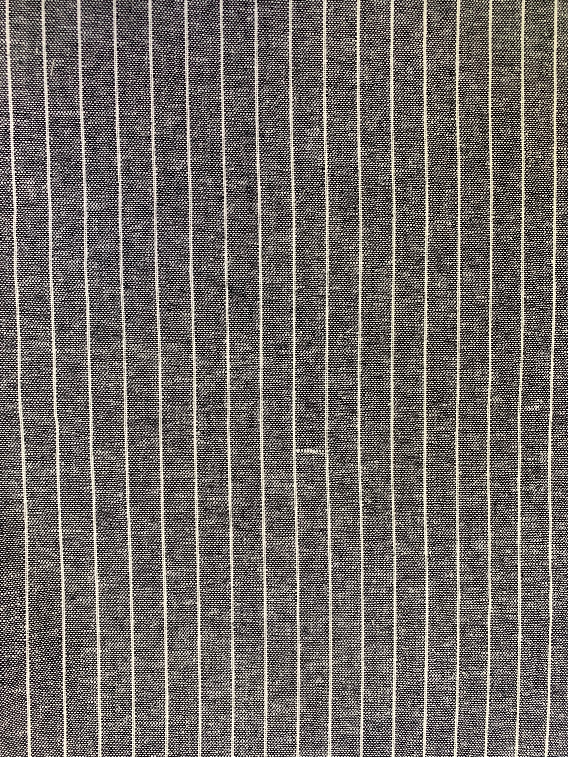 Fabric detail showing the black and white striped design.