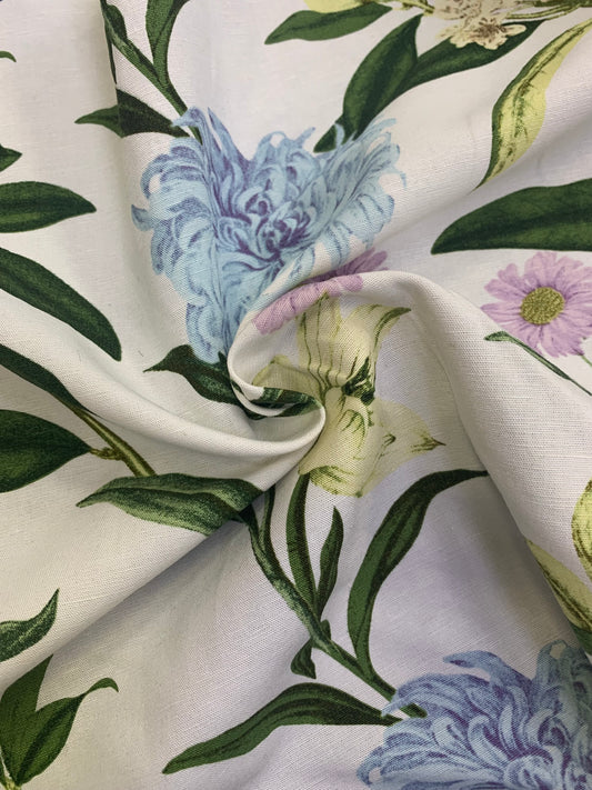 White floral fabric is gathered into a soft central fold