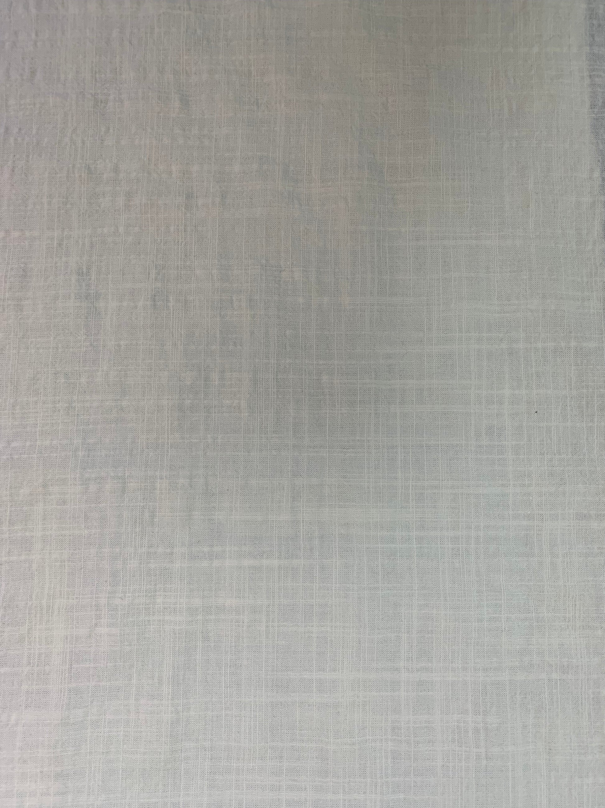 A textured fabric view capturing the soft structure of this ivory cloth.