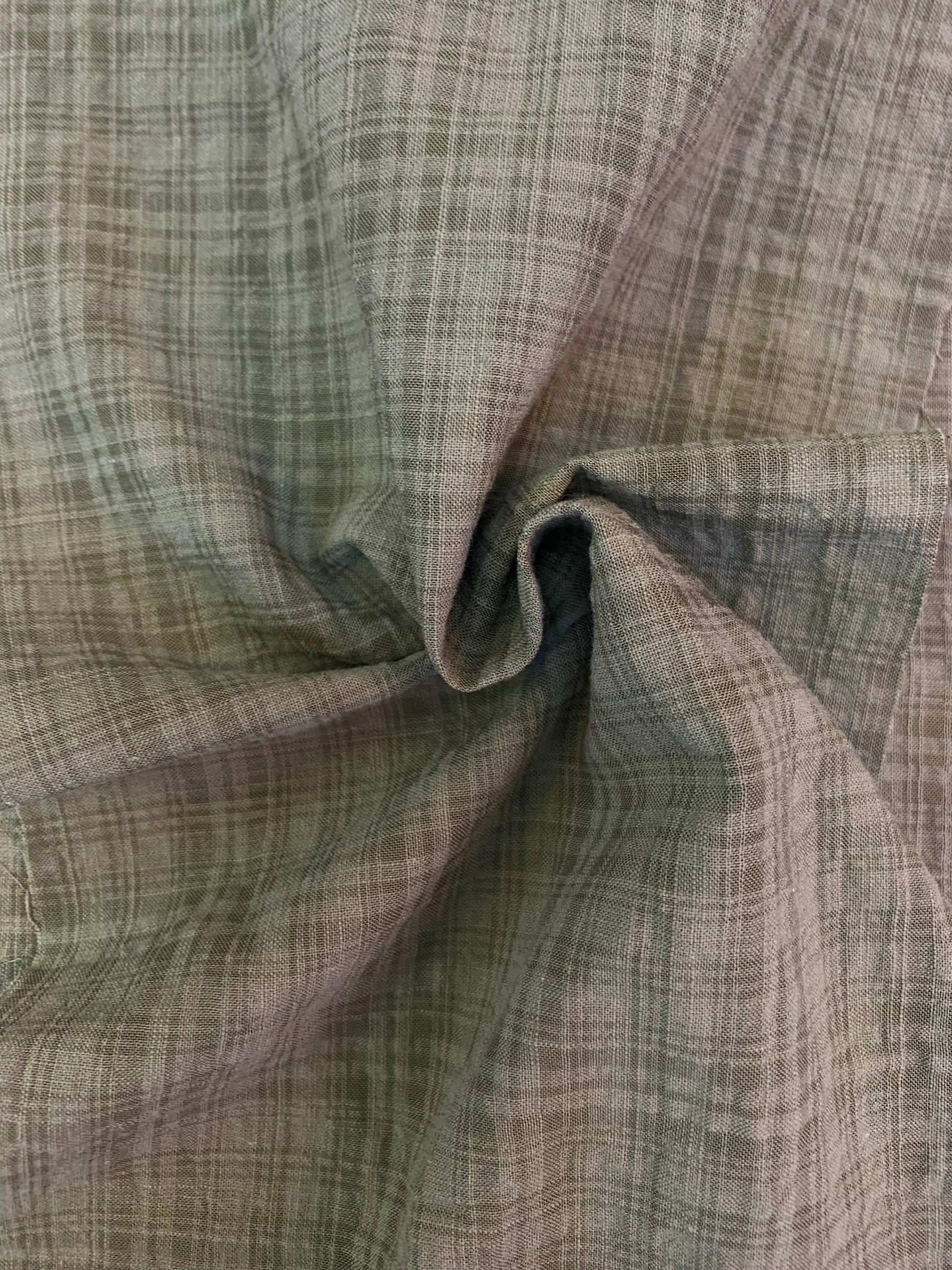 A close fabric view showing the khaki check and subtle crinkle effect.