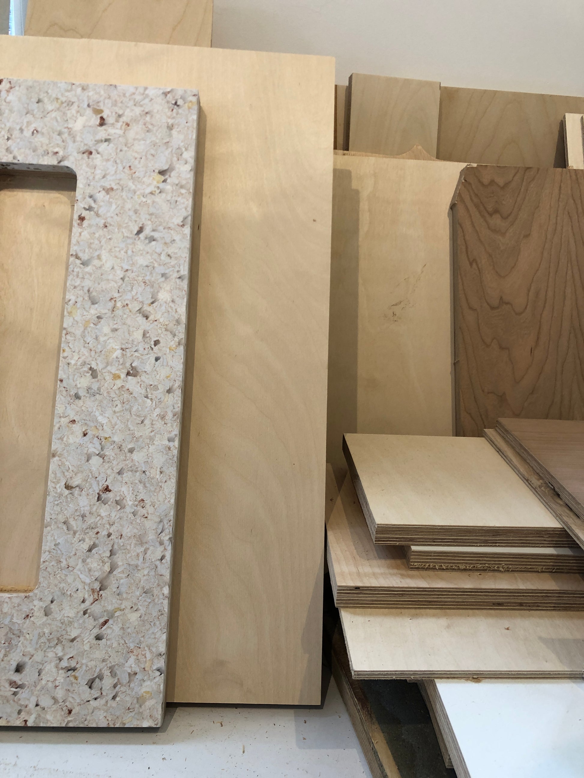 Collection of various-sized off-cut plywood