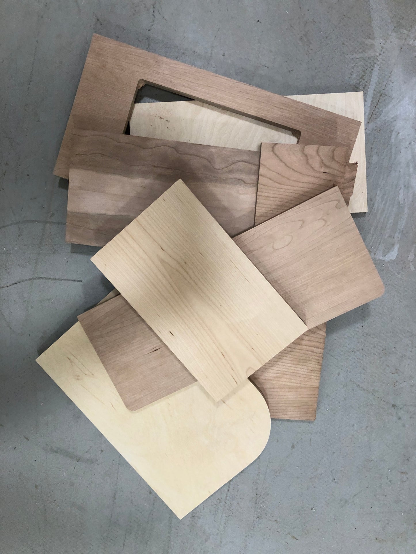 Two bags of collection of various-sized off-cut plywood