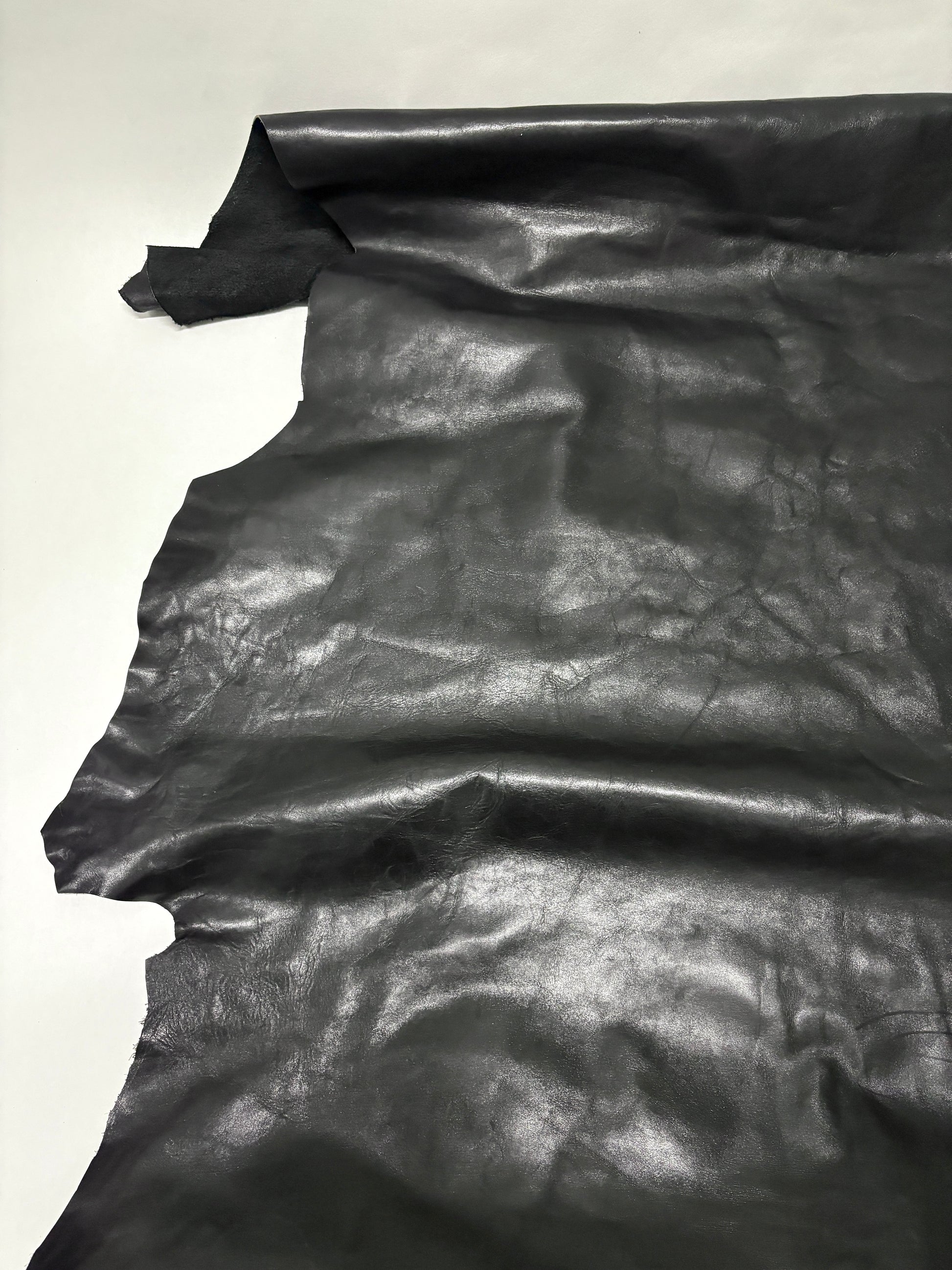 Black leather on a white background