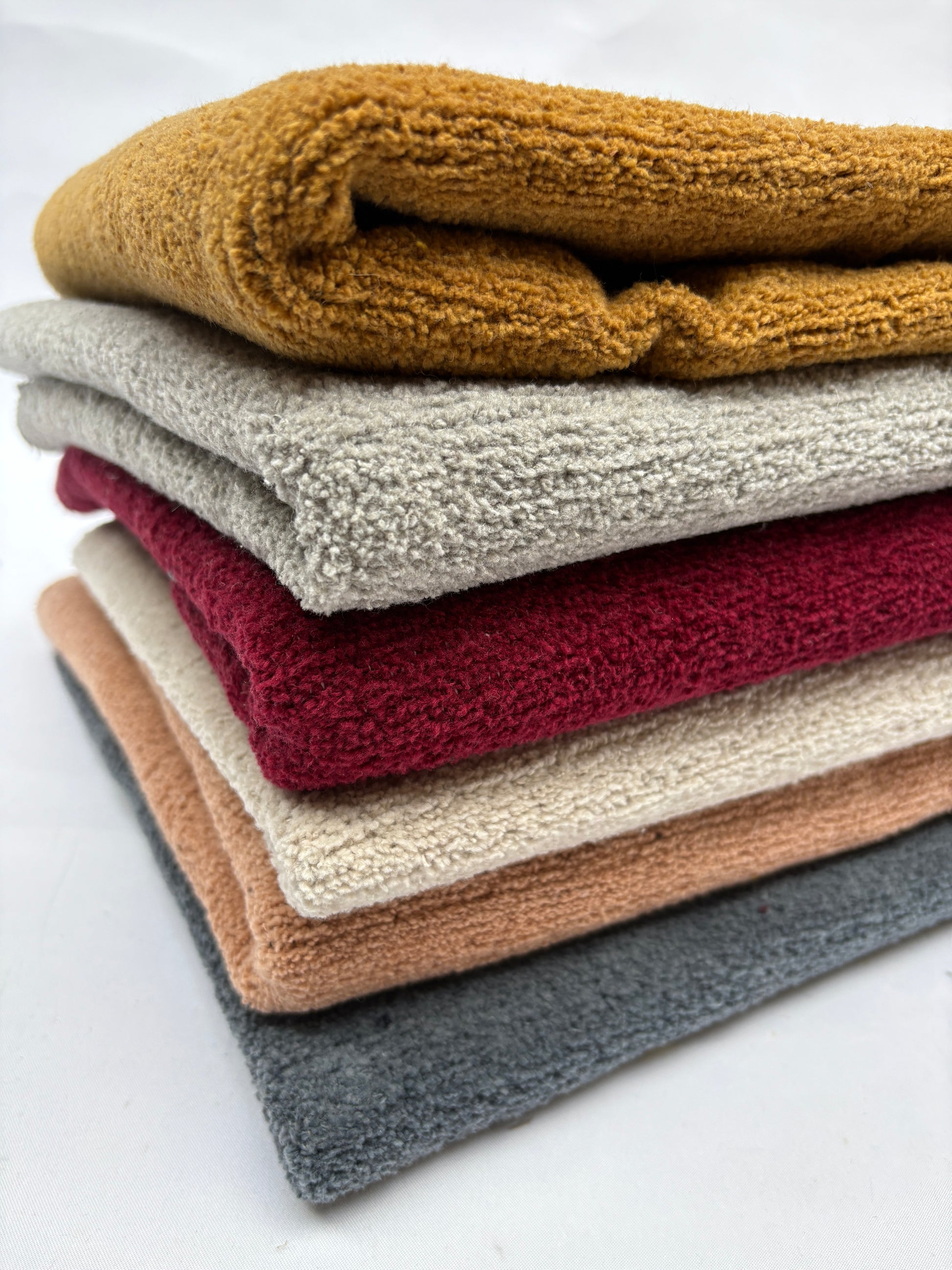 Close-up views show layered fabrics in different colours and textures