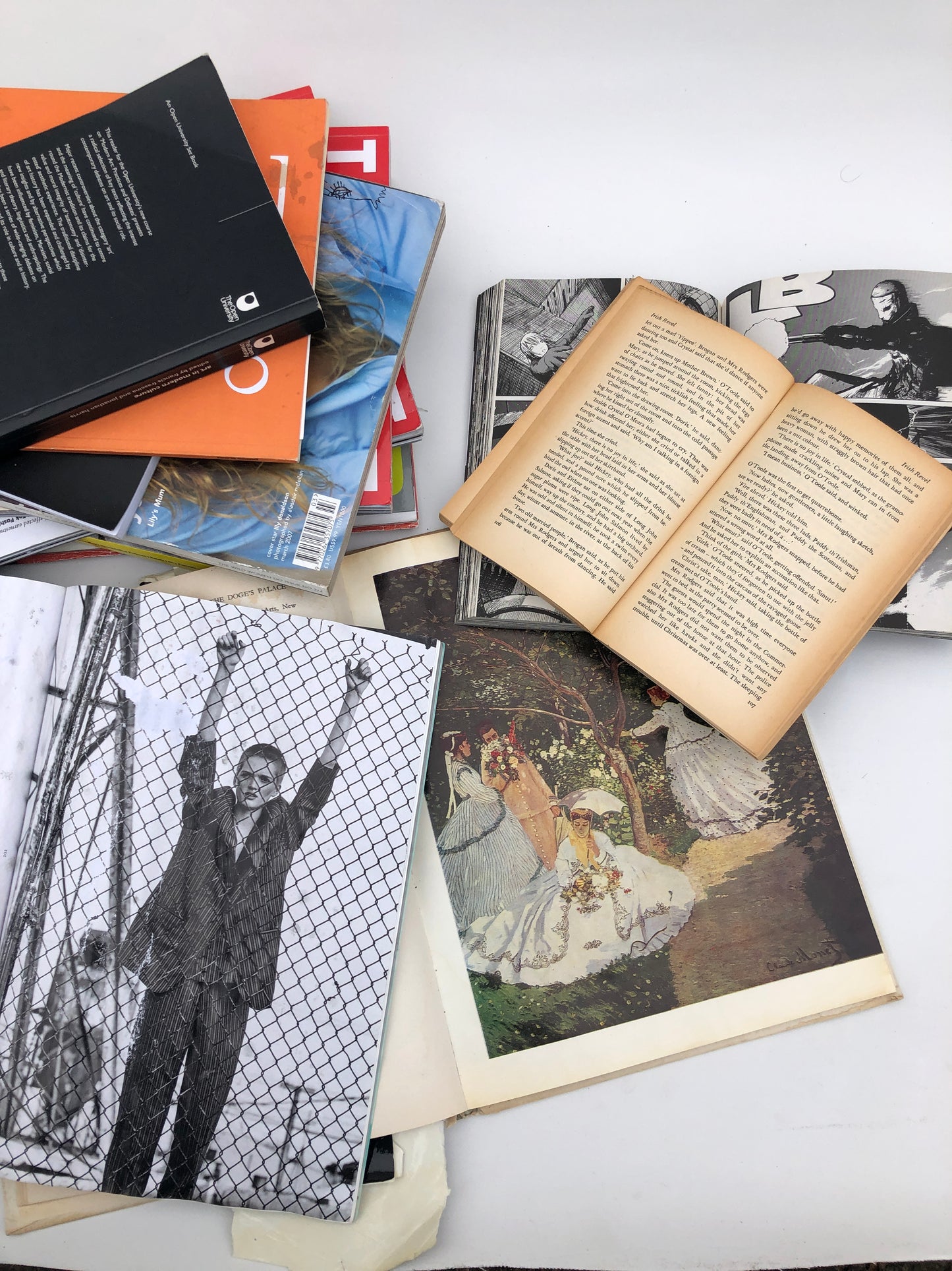 Paper magazines and books, some opened