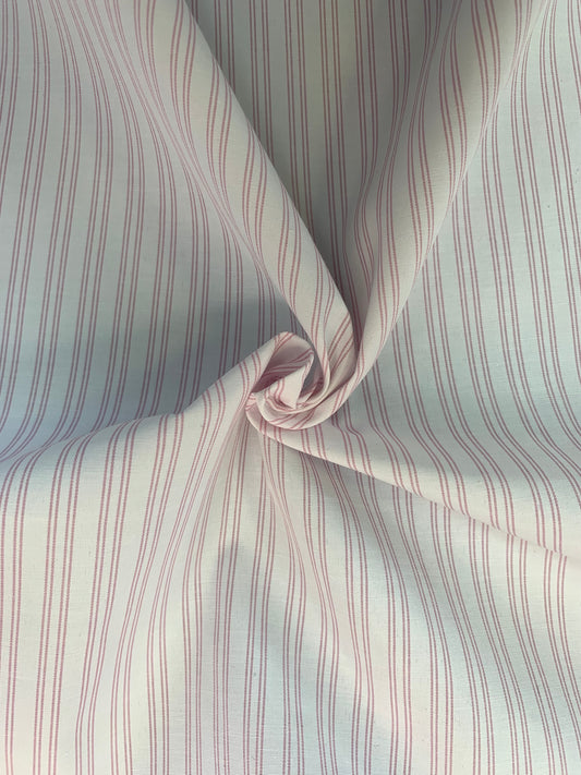 Pink-white shirting gathered to highlight the double stripe design.
