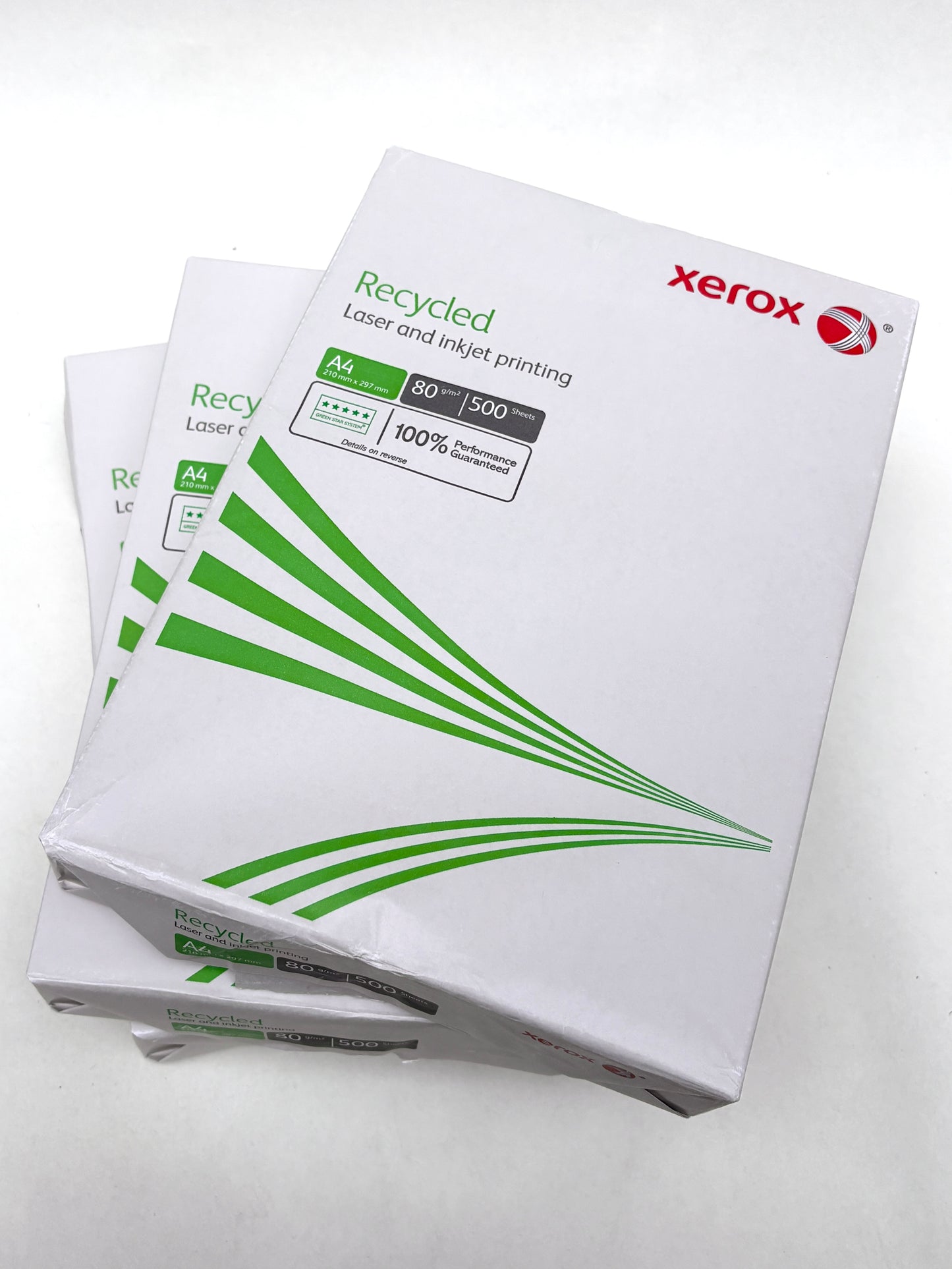 Stacked paper packs are shown on a white background