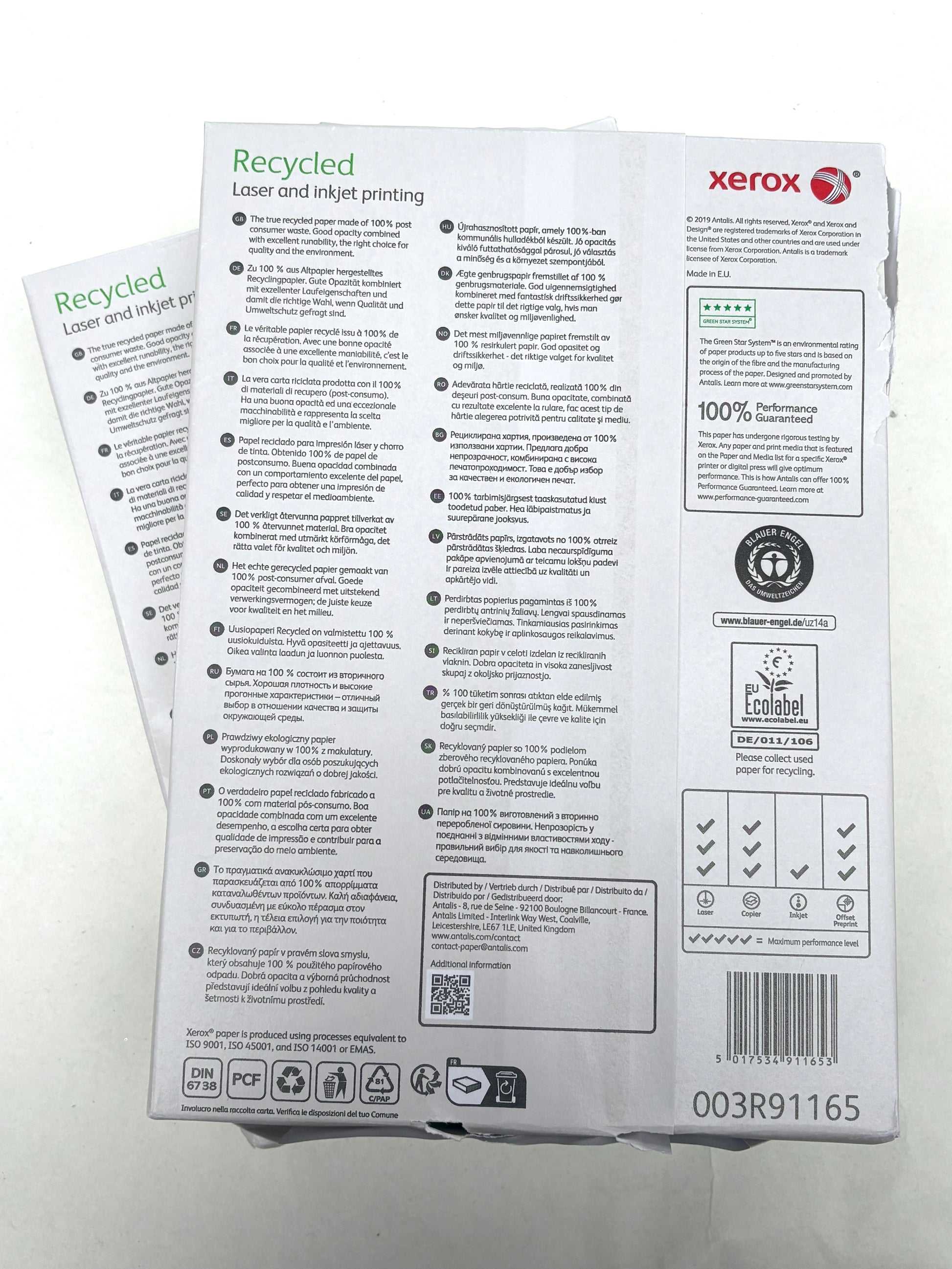 Stacked paper packs are shown on a white background