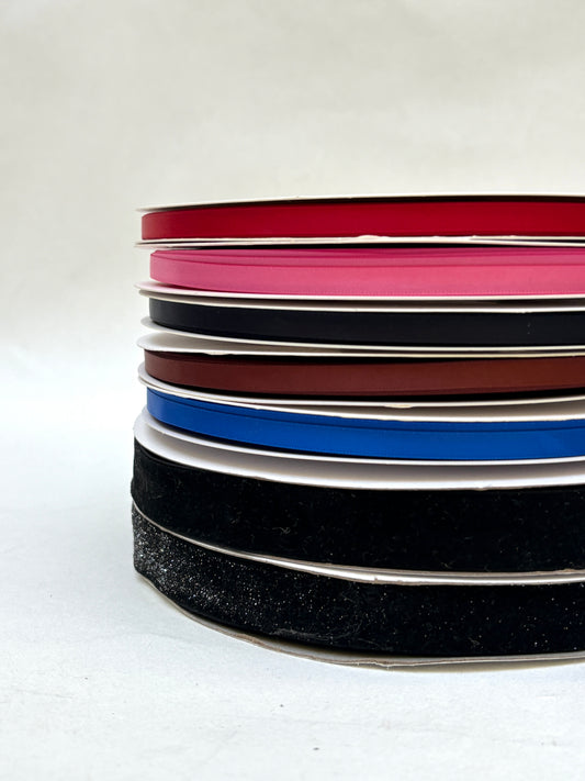     Rectangular tile samples are arranged in layered stacks on a white background.