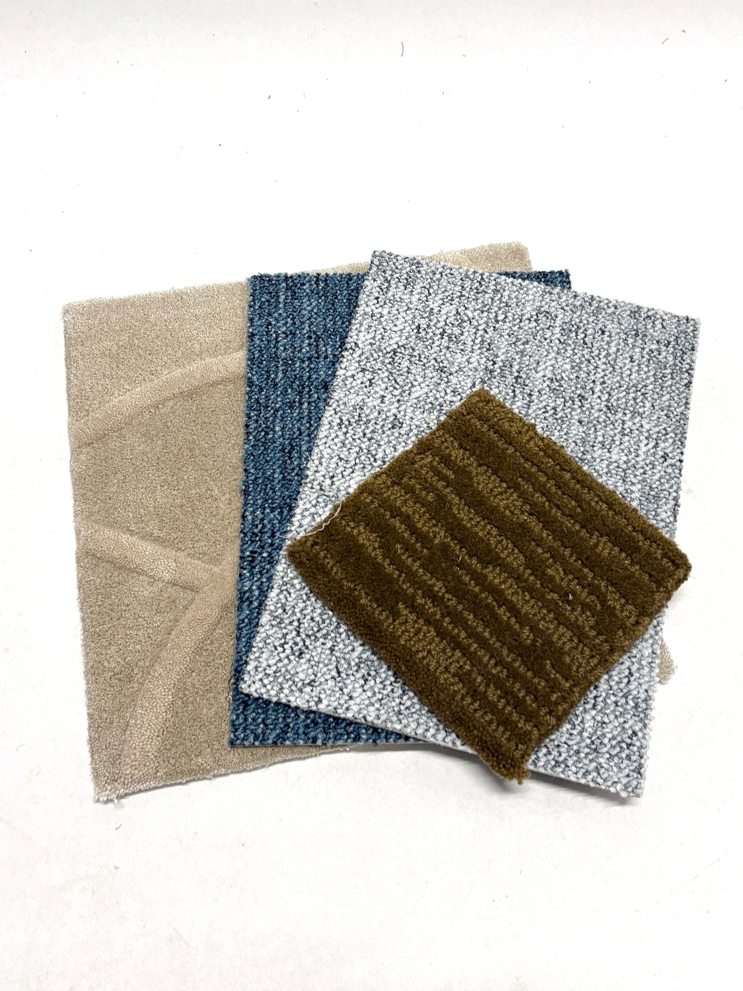 Small sample swatches are arranged in stacked and spread-out groups