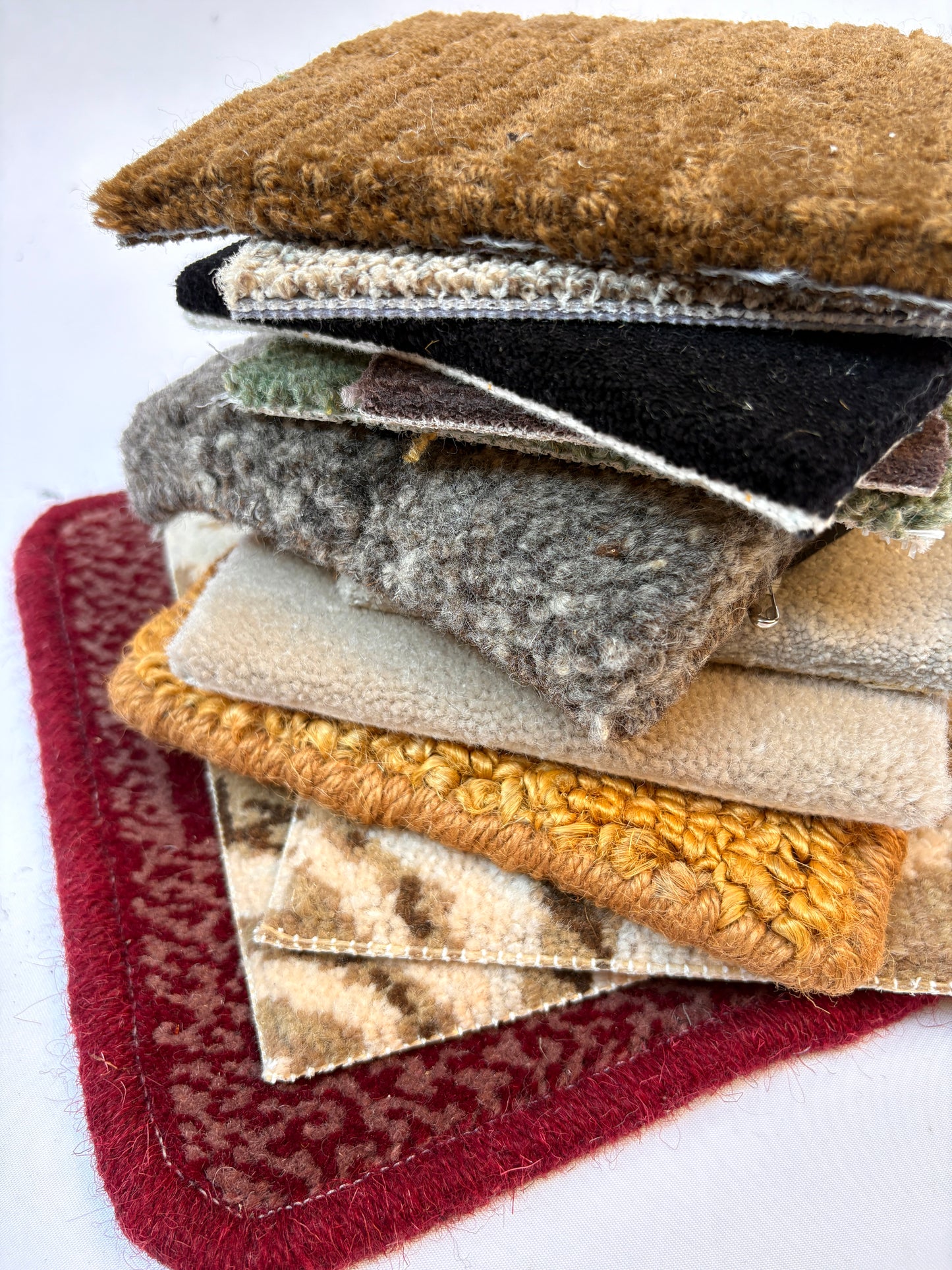 Mixed swatches in varied shapes and finishes are displayed together