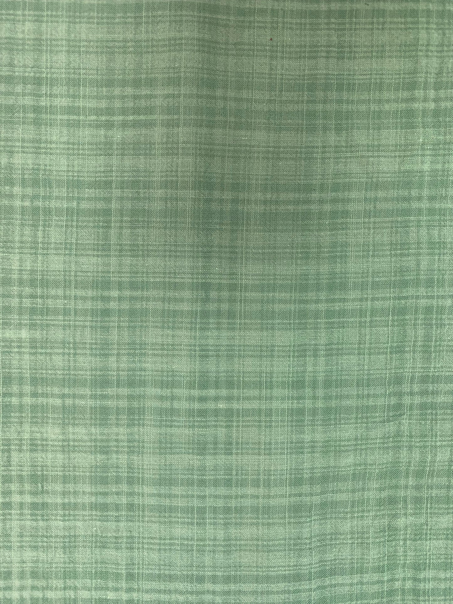 Sage green cotton-viscose blend fabric with a lightweight checked finish.