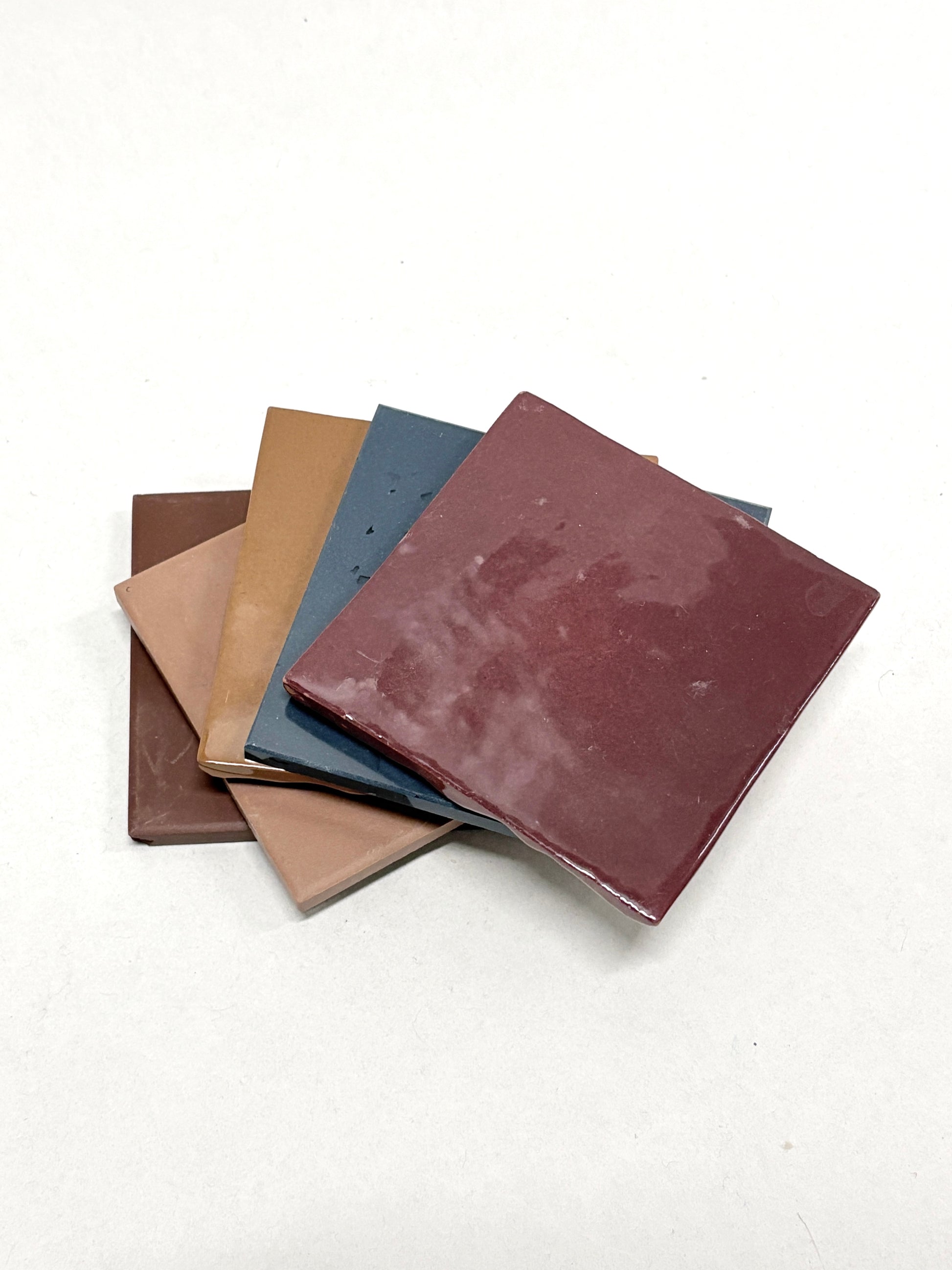 Small square sample pieces are shown in mixed colours and finishes