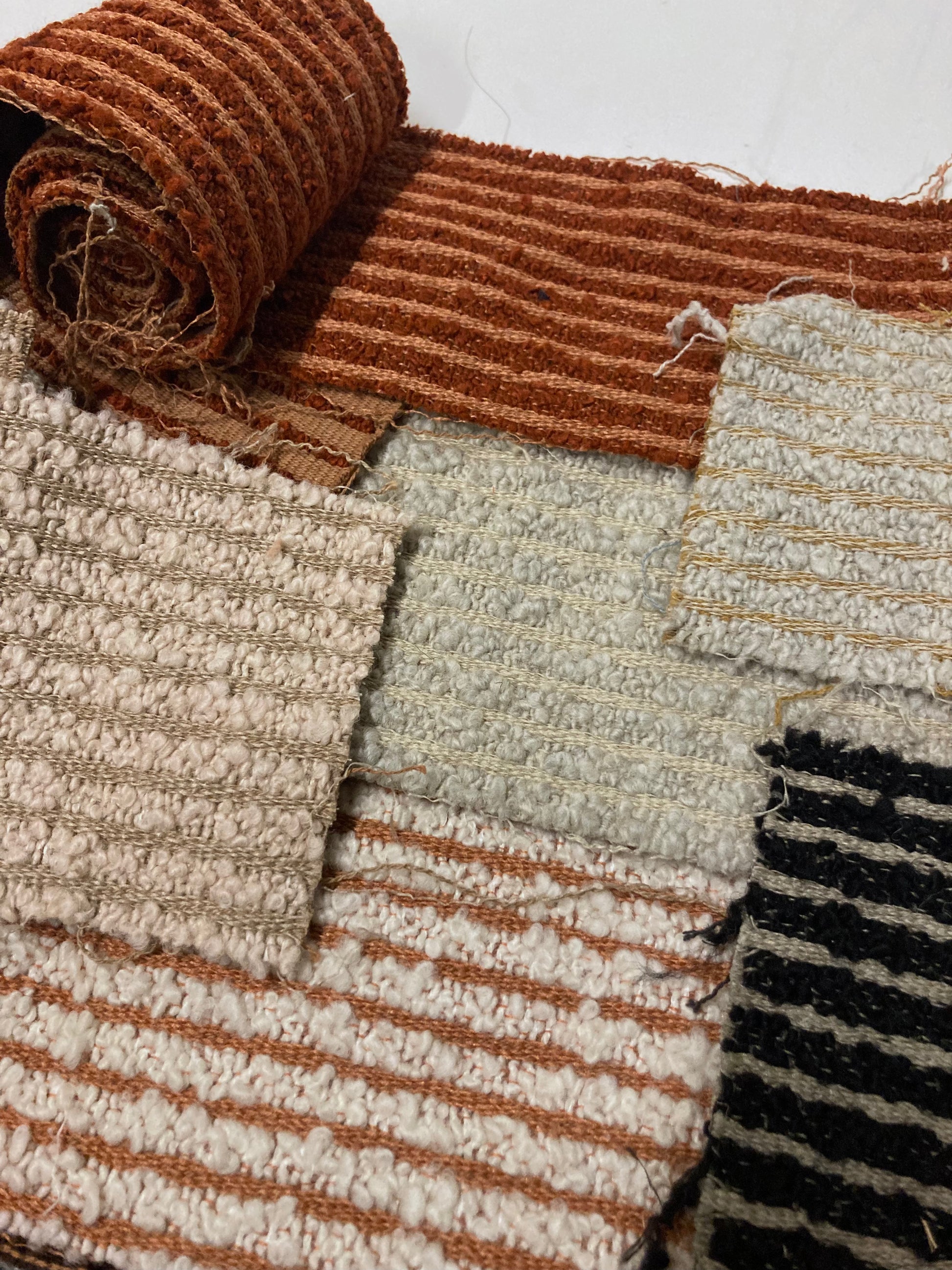 Close-up views show striped woven swatches in different colours