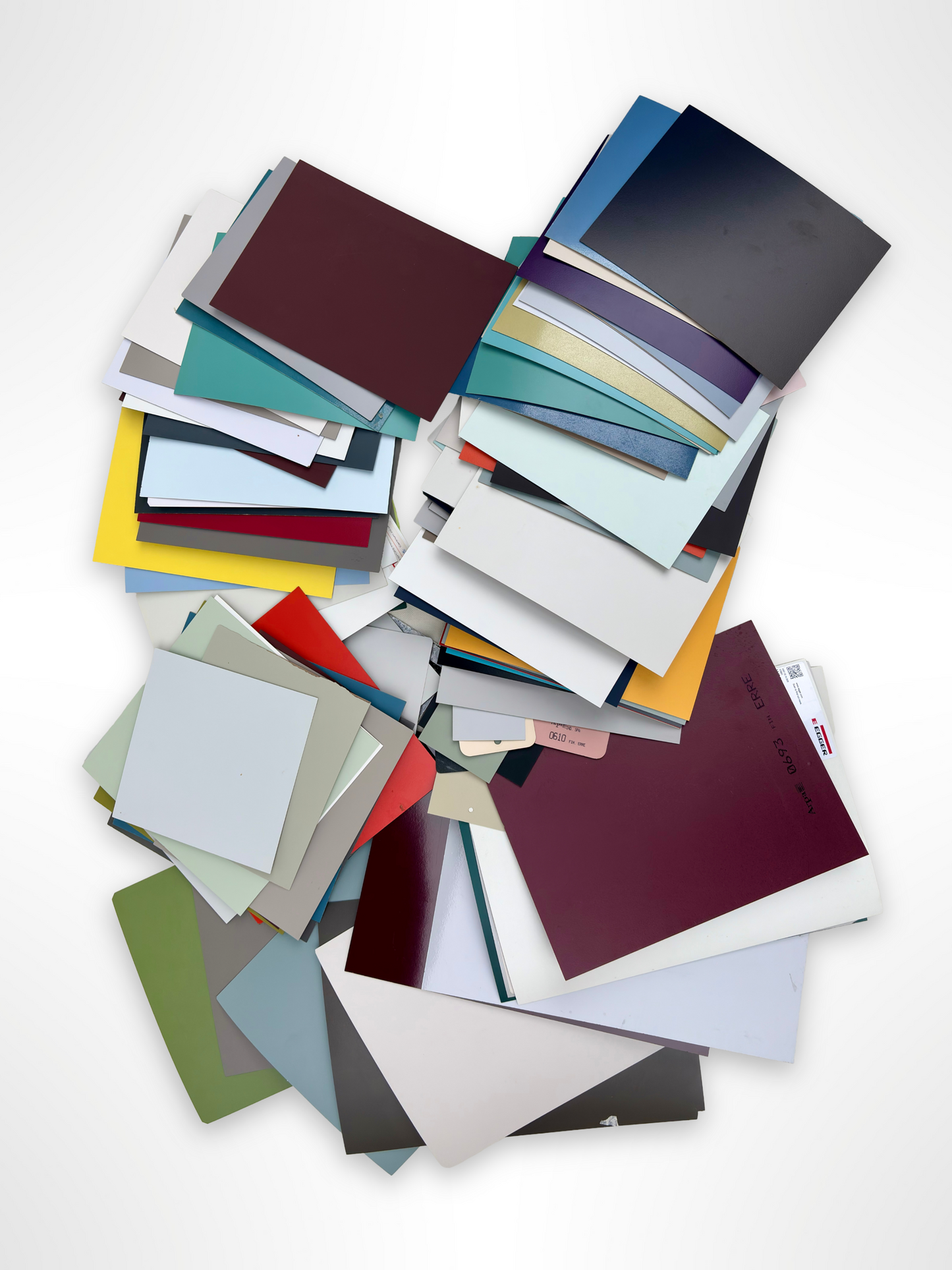 Close-up views show layered sheets in varied sizes and colours