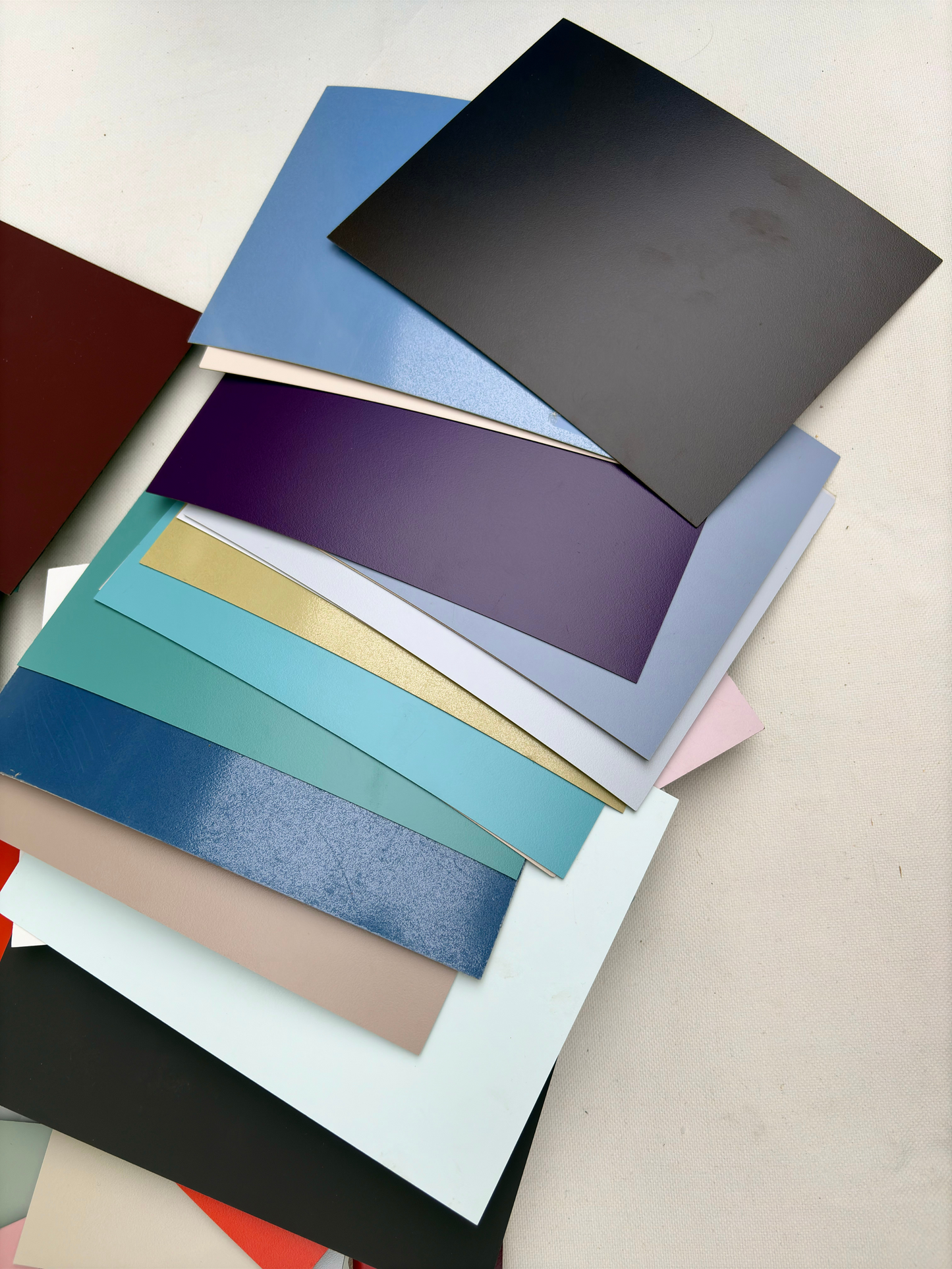 Mixed coloured sheets are shown in detail from different angles