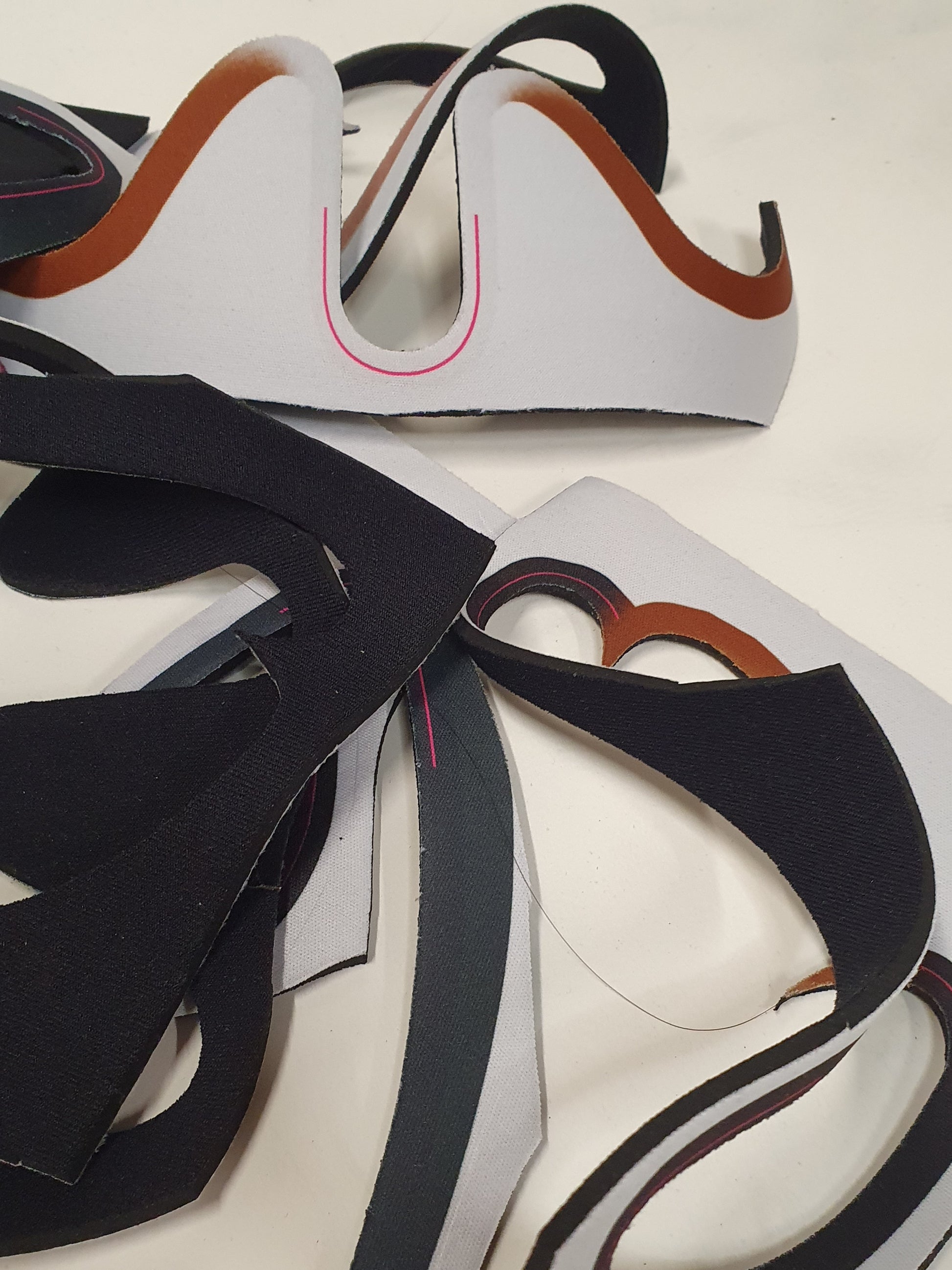 Close-up views show black, white, and edged offcuts in detail.