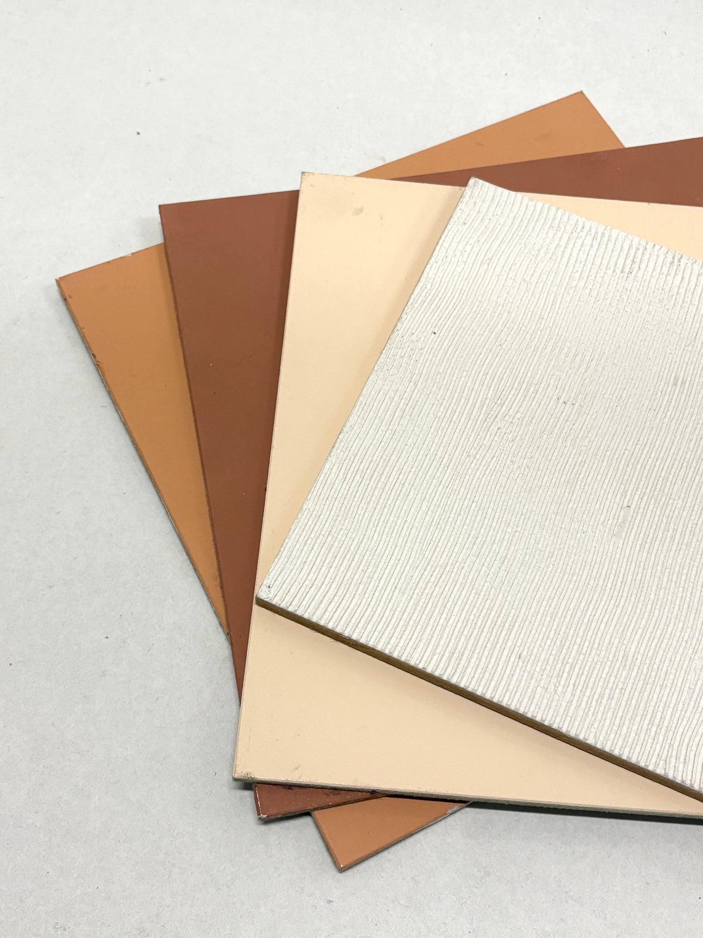 Rectangular sample pieces are arranged in grouped and layered stacks