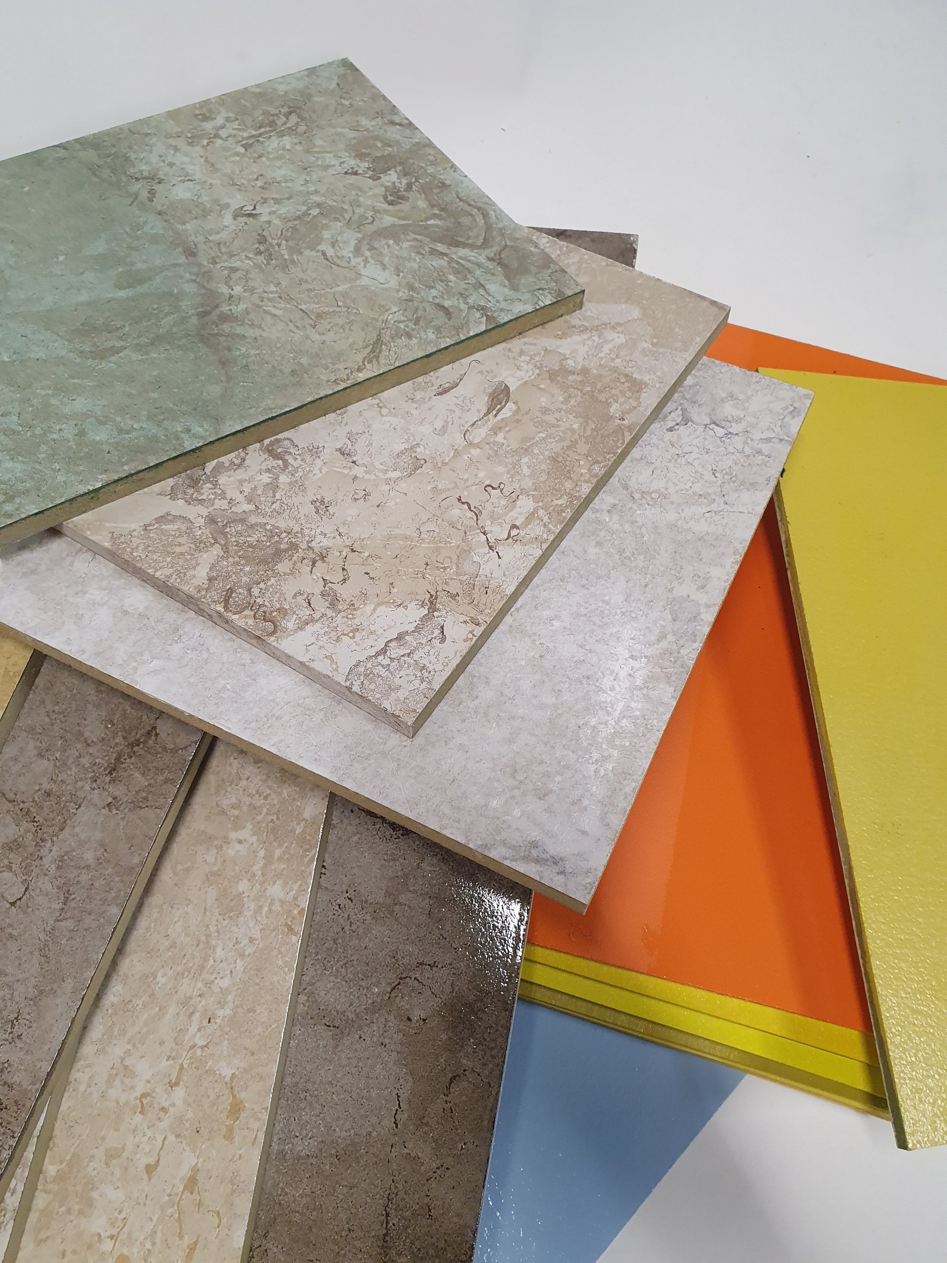 Close-up views show stacked boards with smooth and textured surfaces