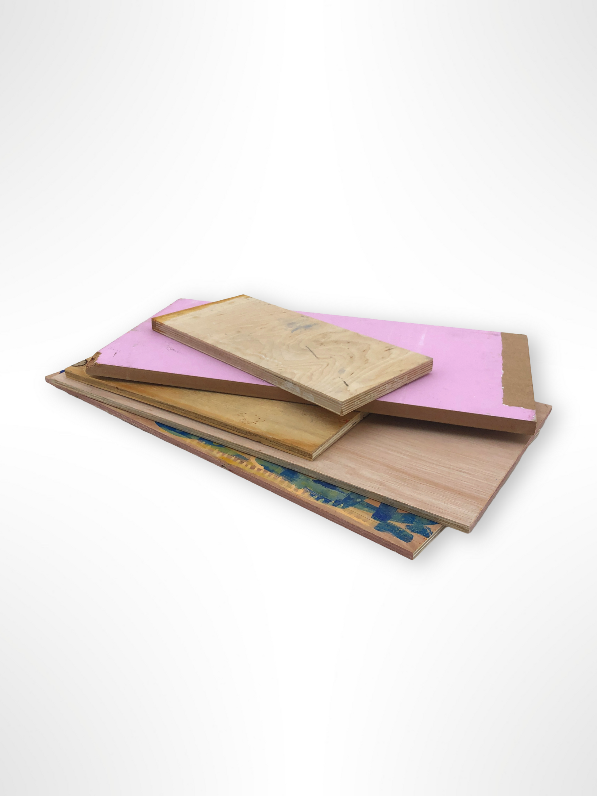 wood sample boards are stacked on a white background