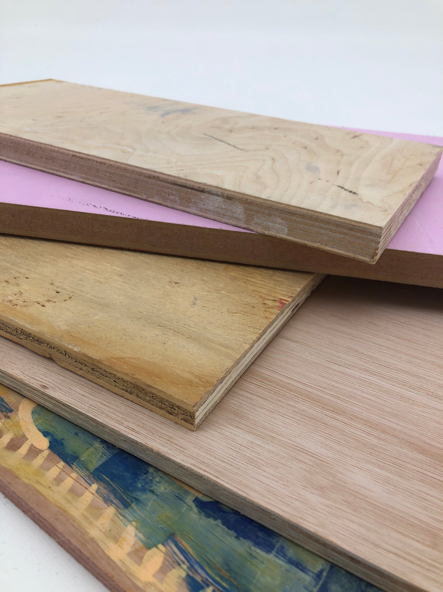 Mixed wooden panels in different colours are layered together in details