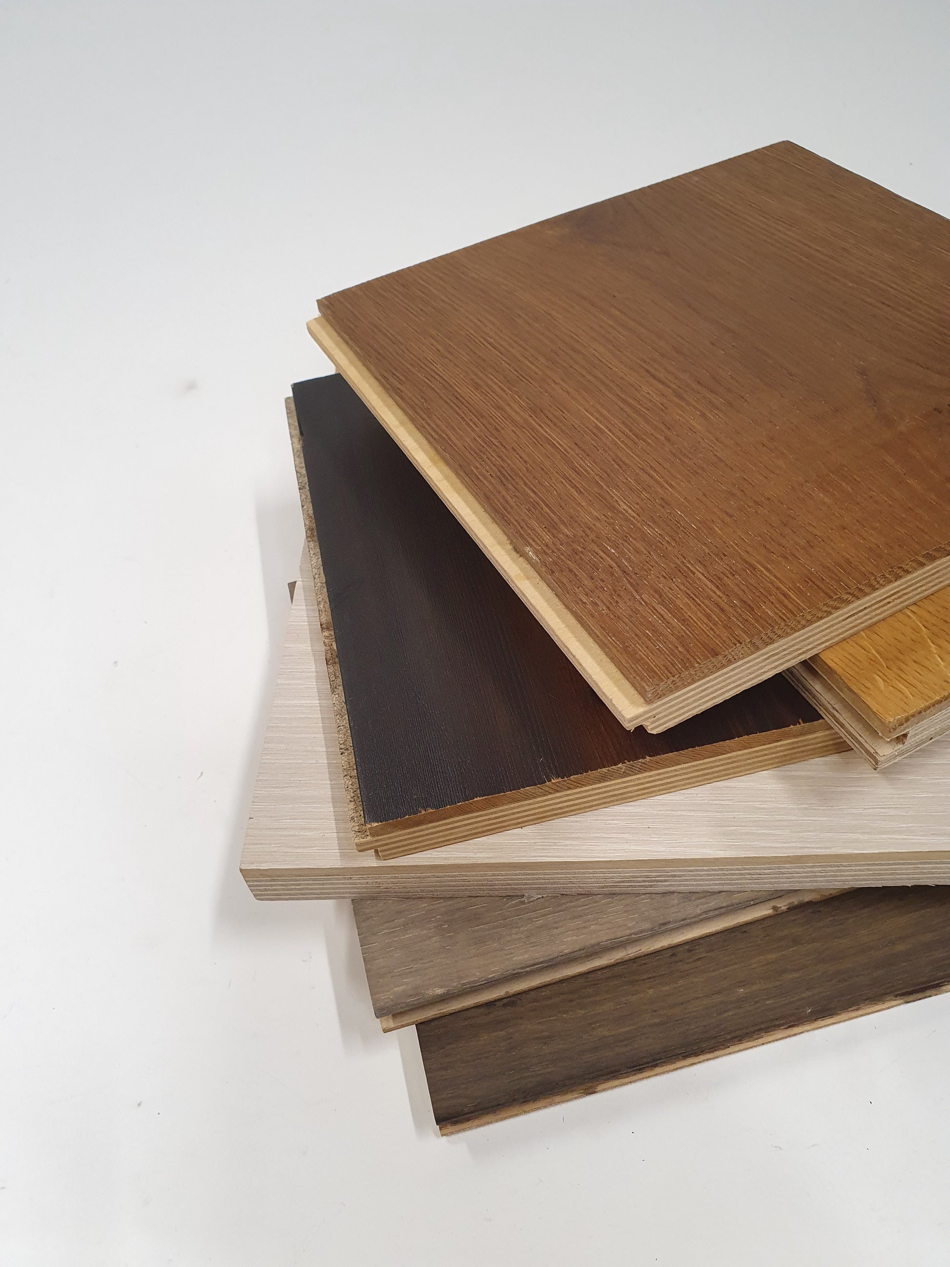 Close-up view shows layered boards in different wood tones