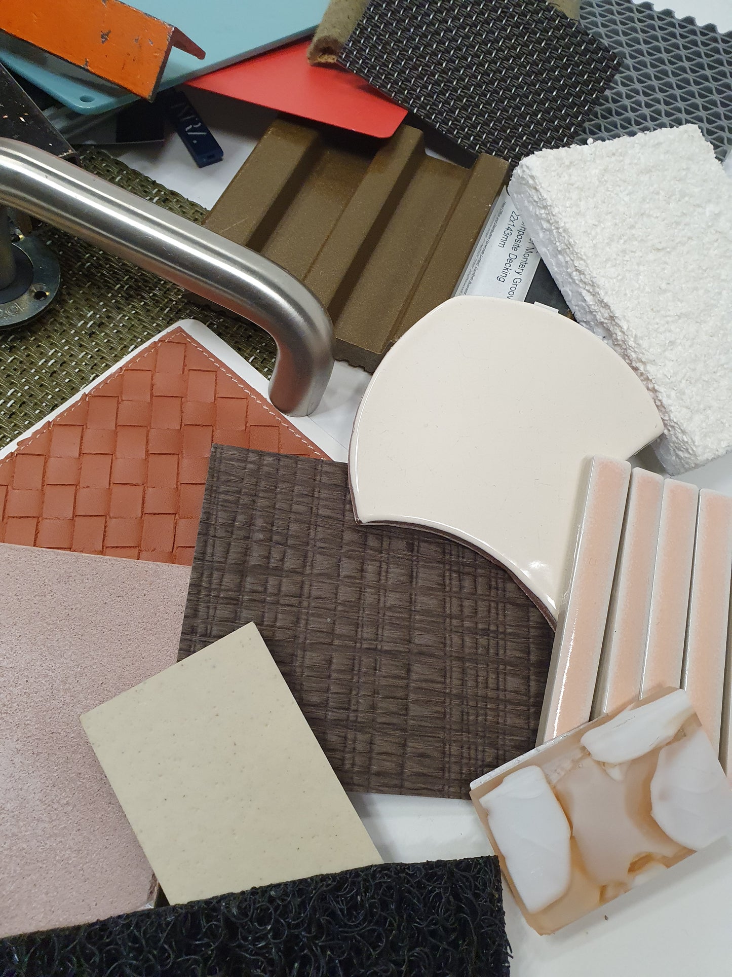 Collection of mixed hard pieces of architectural materials, including woods and metals