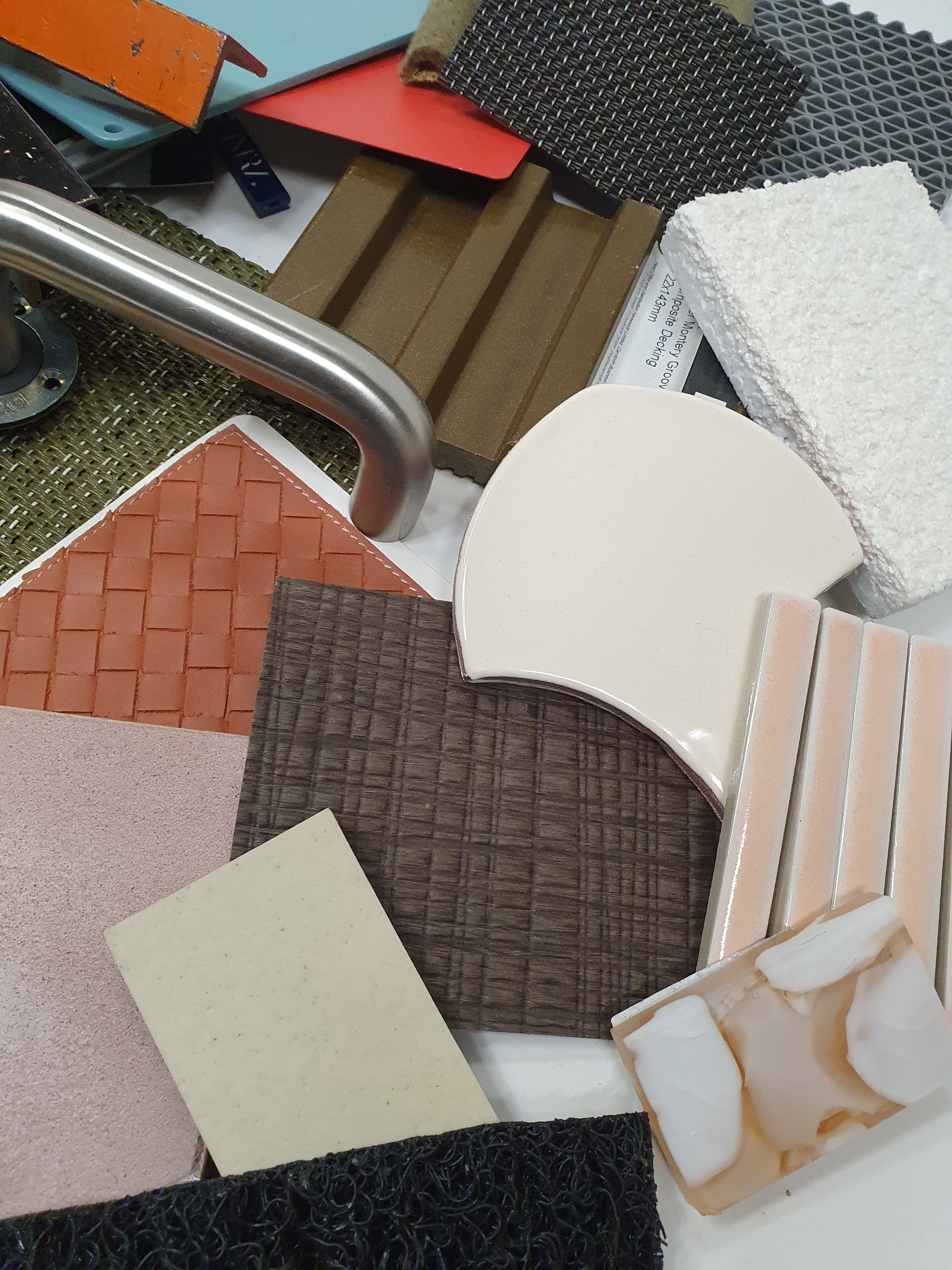 Collection of mixed hard pieces of architectural materials, including woods and metals