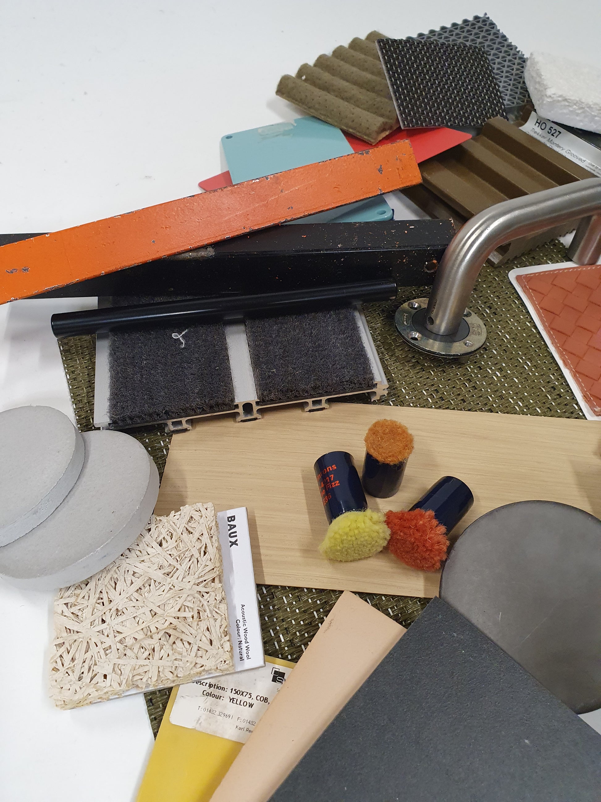 Collection of mixed hard pieces of architectural materials, including woods and metals