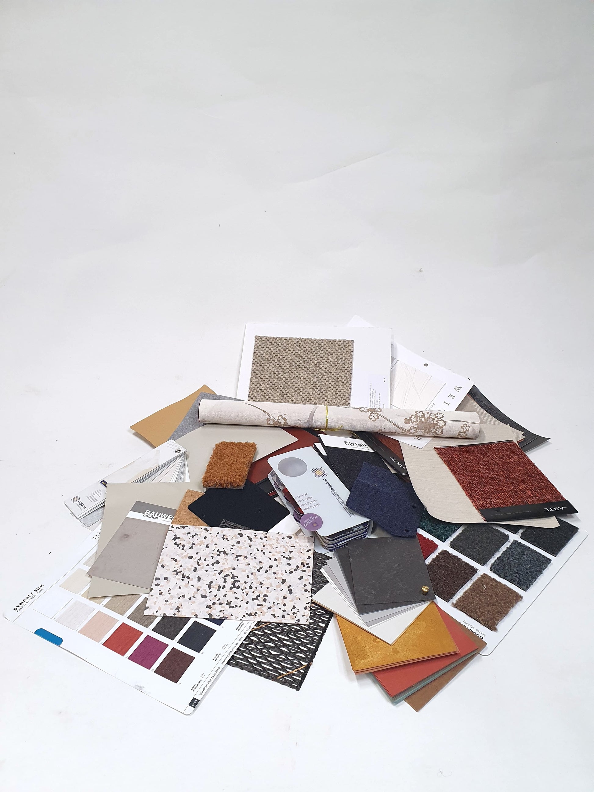 Collection of soft pieces of architectural materials, including fabrics
