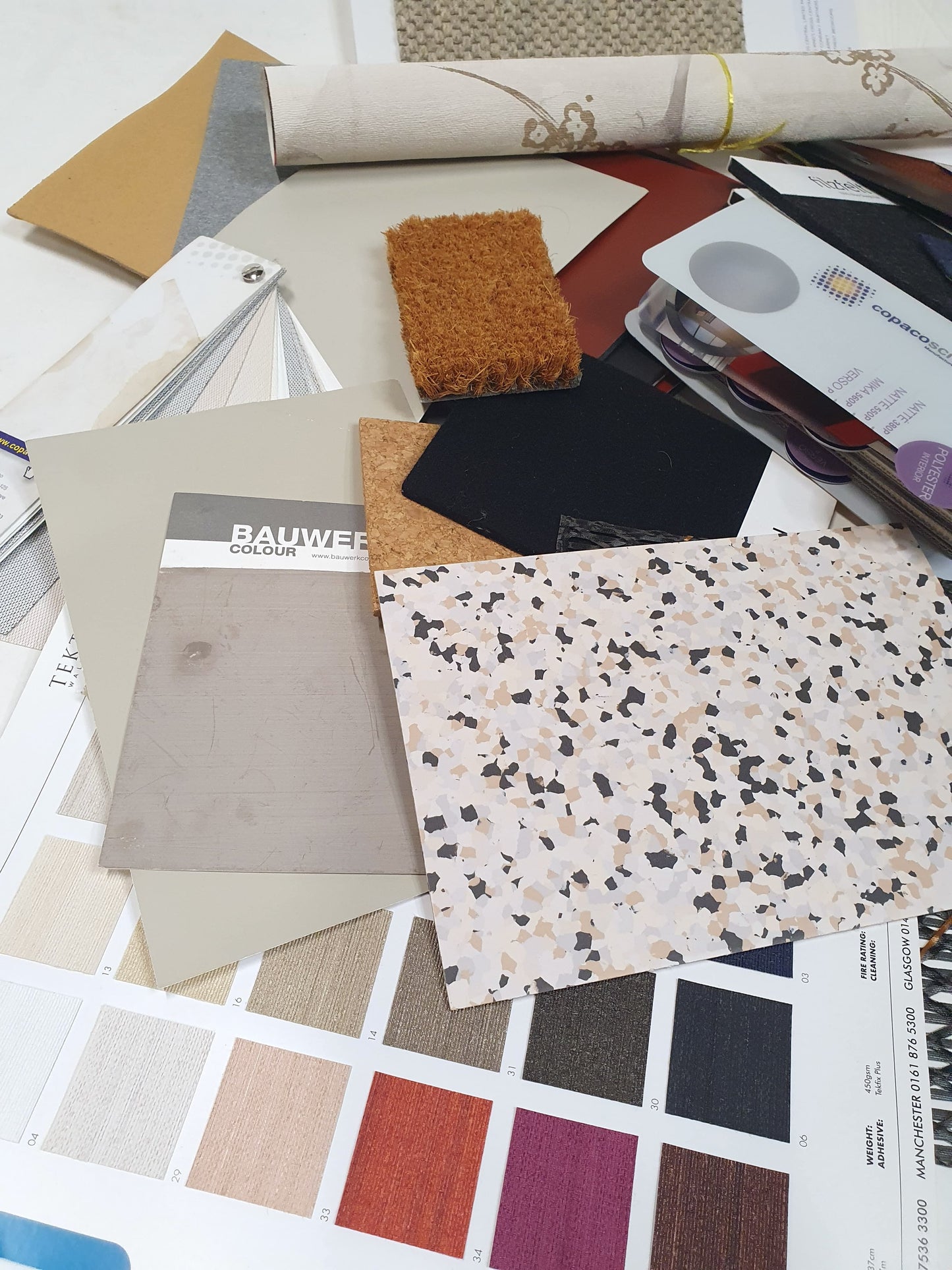 Collection of soft pieces of architectural materials, including fabrics