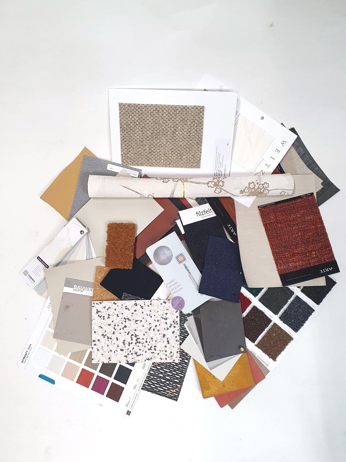 Collection of soft pieces of architectural materials, including fabrics