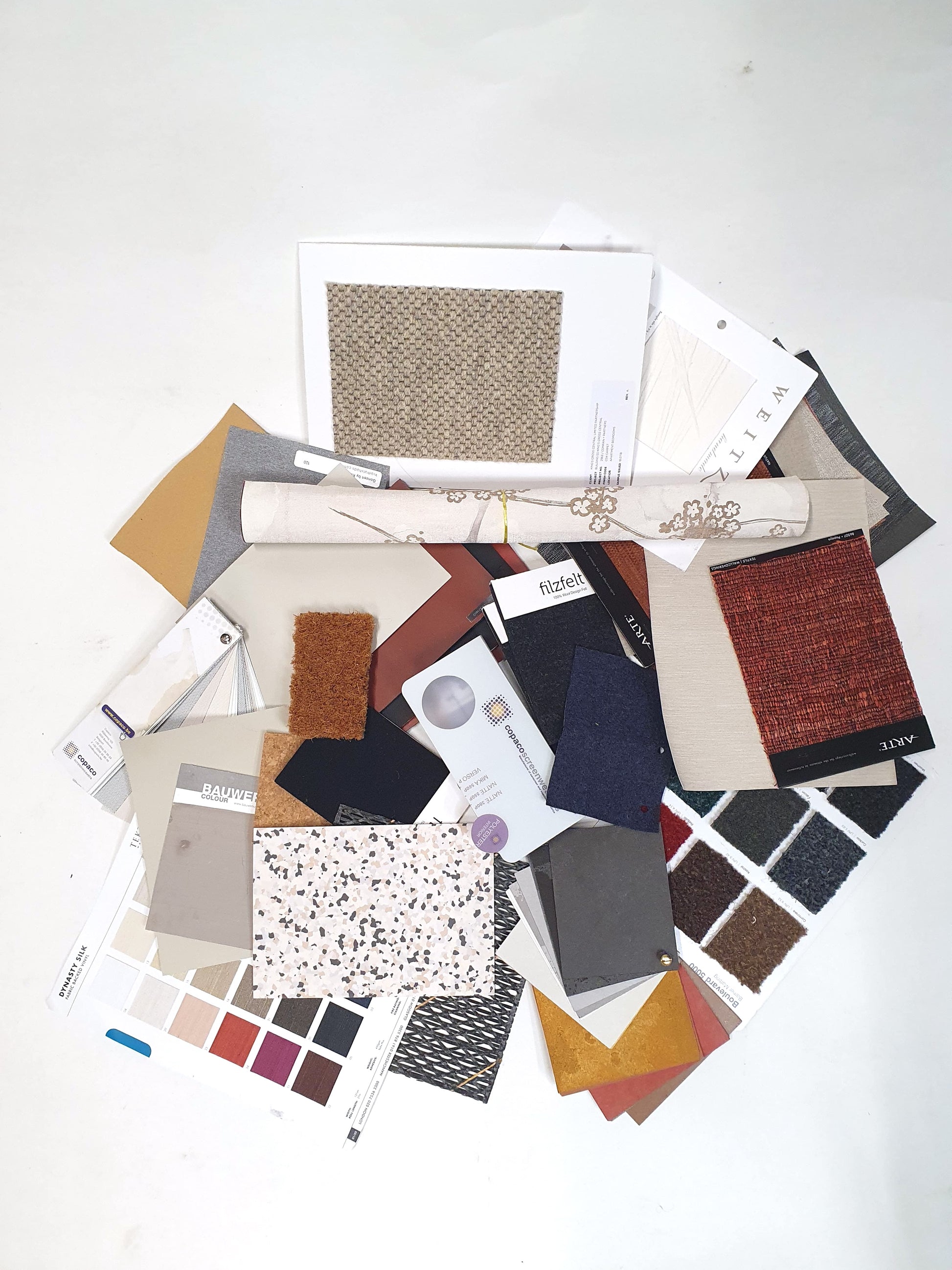 Collection of soft pieces of architectural materials, including fabrics