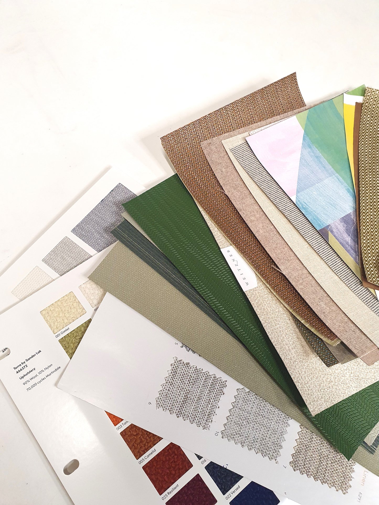 Collection of architectural wallpaper samples in various colours and sizes 