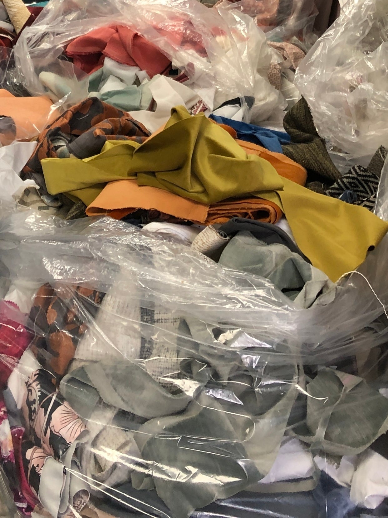 Collection of various textured fabric samples in a patterned 