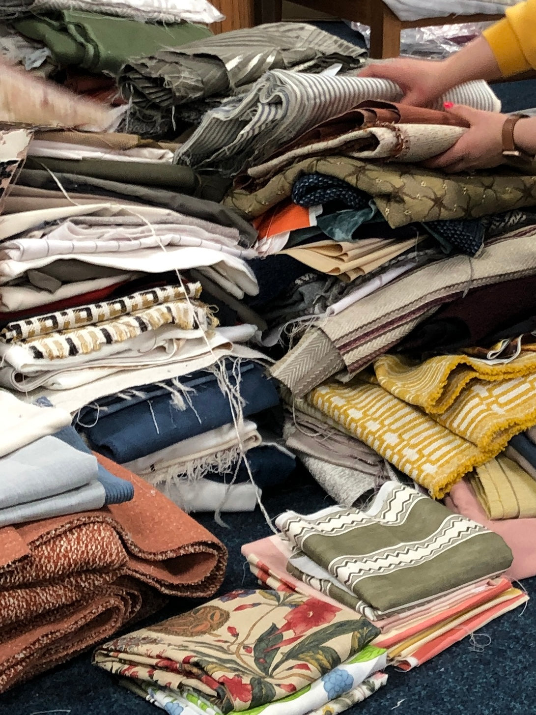 Collection of various textured fabric samples in a patterned 