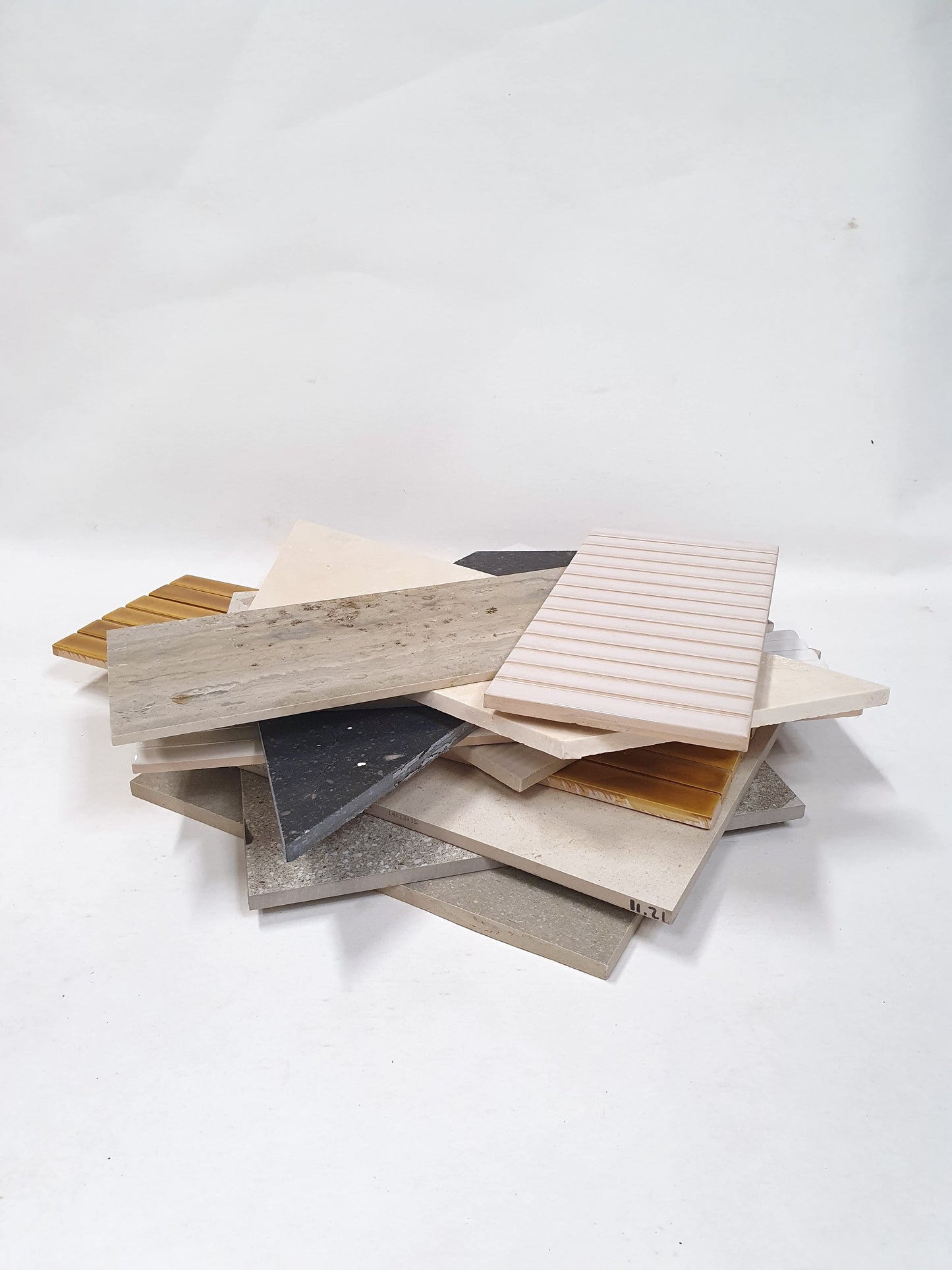 Collection of big tiles in various patterns and colours 