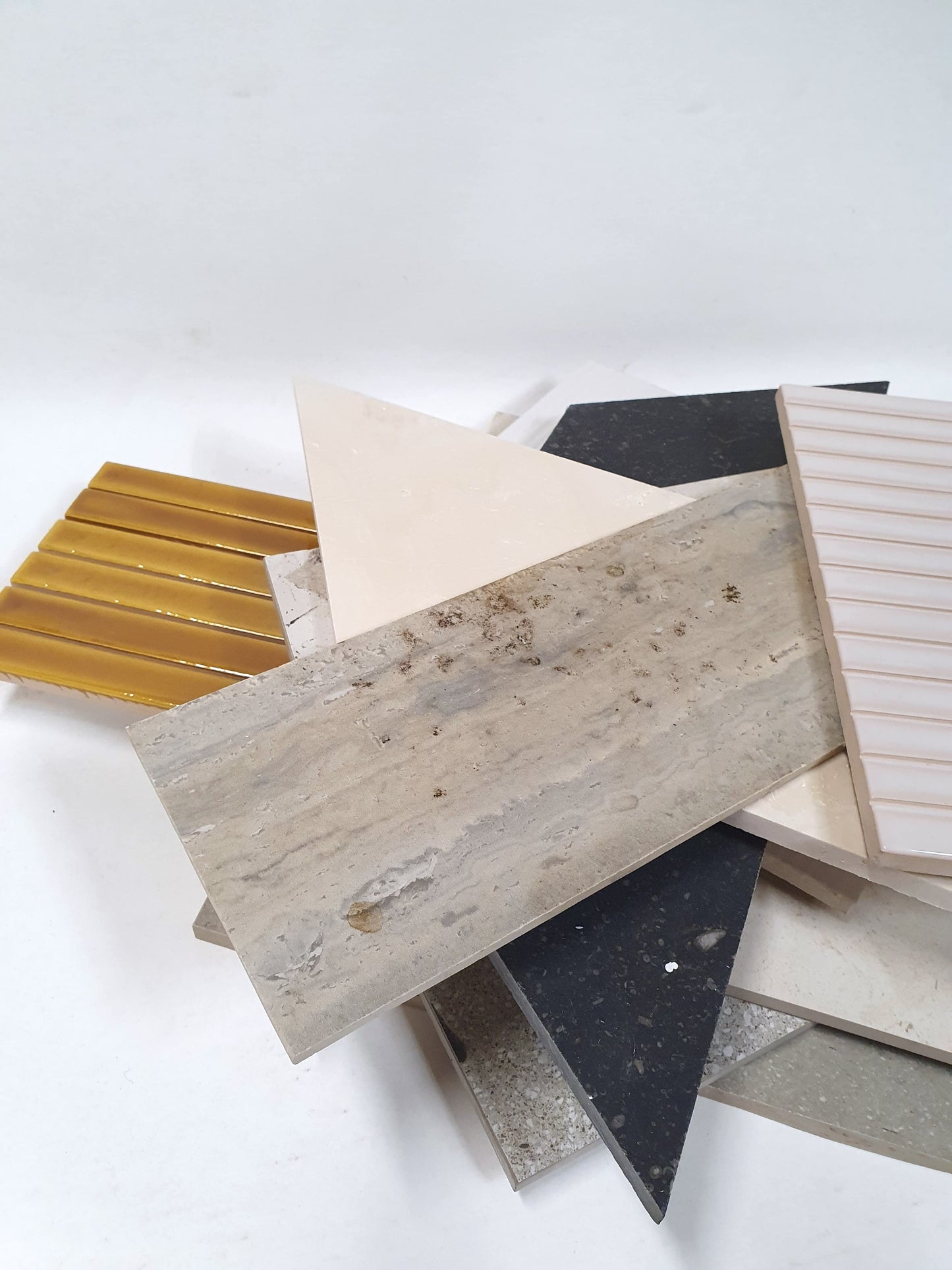 Collection of big tiles in various patterns and colours 
