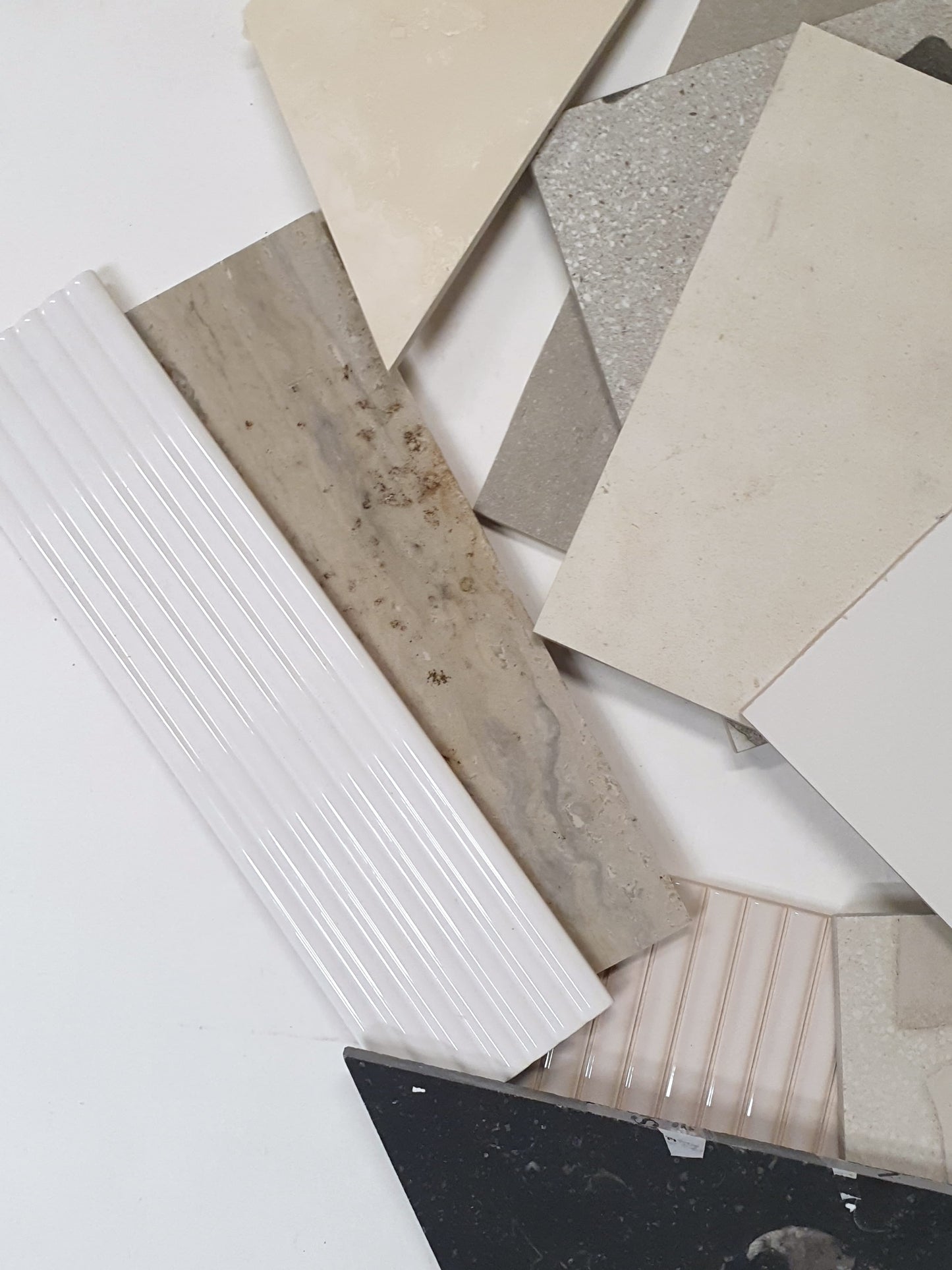 Collection of big tiles in various patterns and colours 