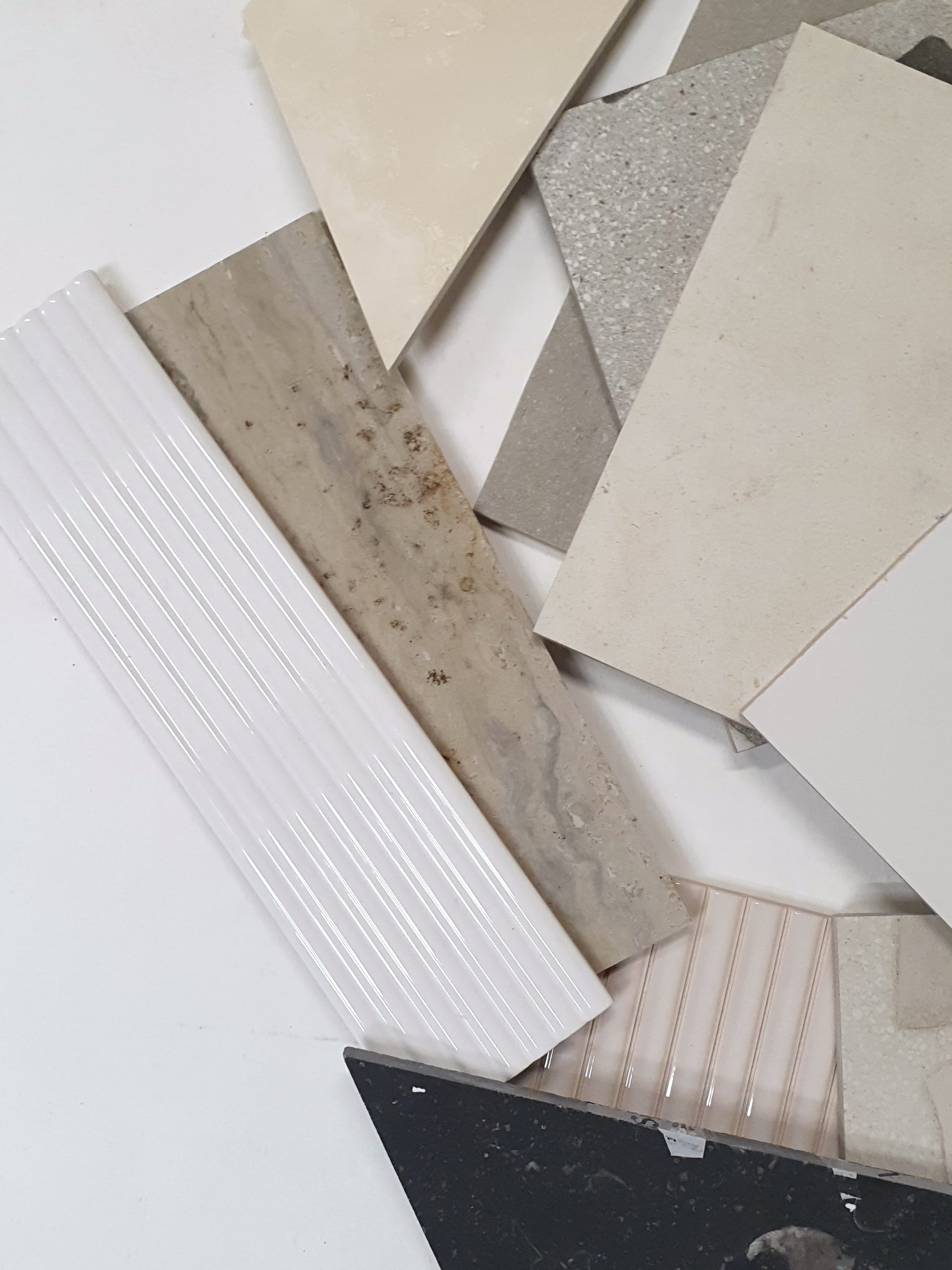 Collection of big tiles in various patterns and colours 